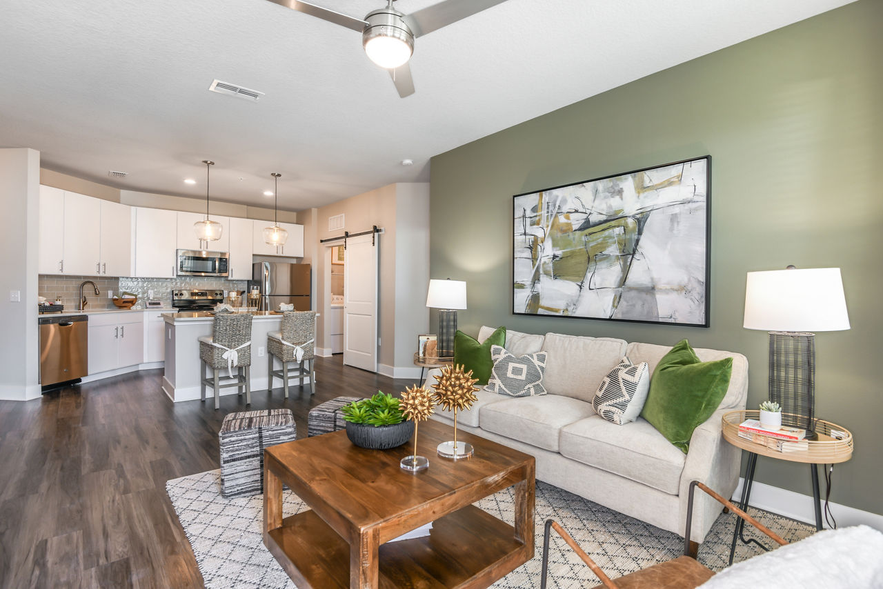 Living room with modern decor at The Lodge at Hamlin Apartments