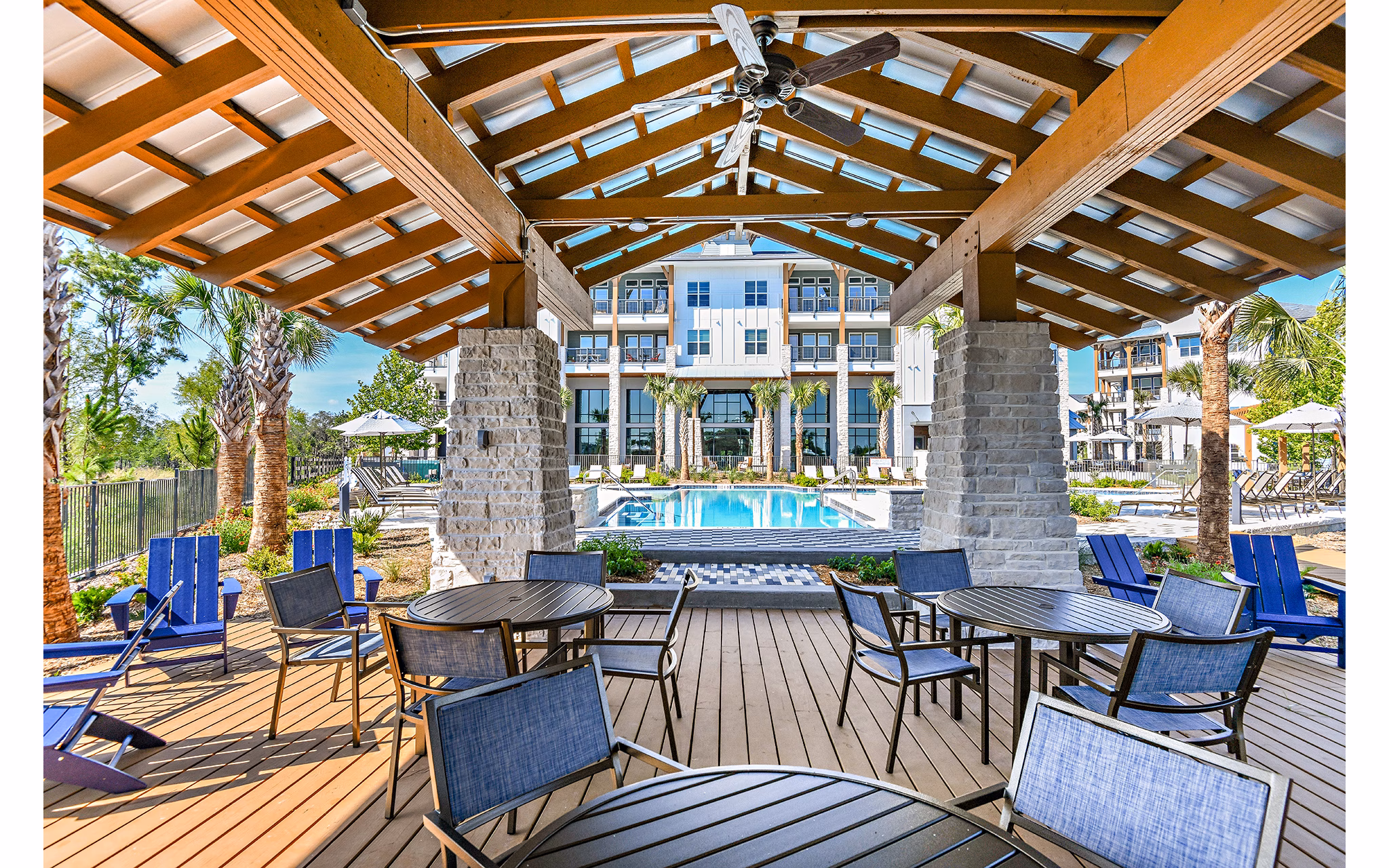 Patio area with modern furniture at The Lodge at Hamlin Apartments offers outdoor luxury living