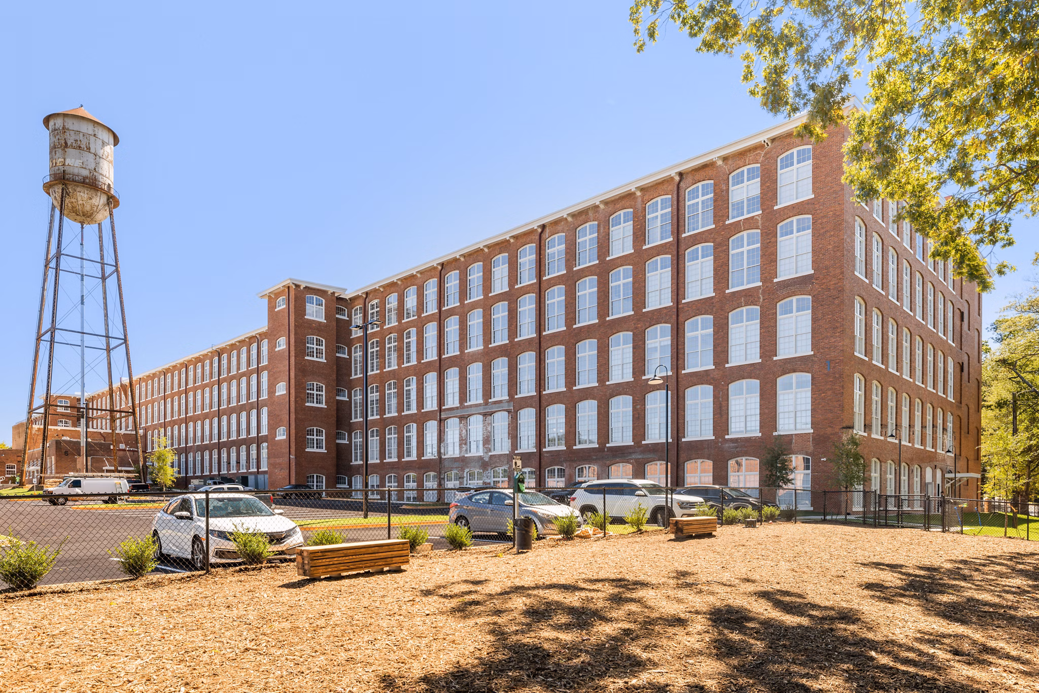 The Lofts at Woodside Mill: Historic mill luxury apartments in Greystar's vibrant location