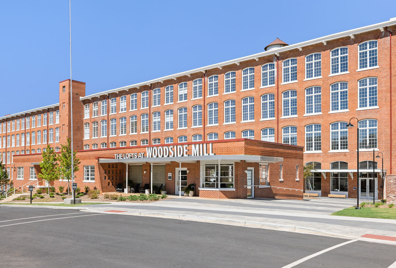 The Lofts at Woodside Mill: Historic brick luxury apartments in Greenville, SC.