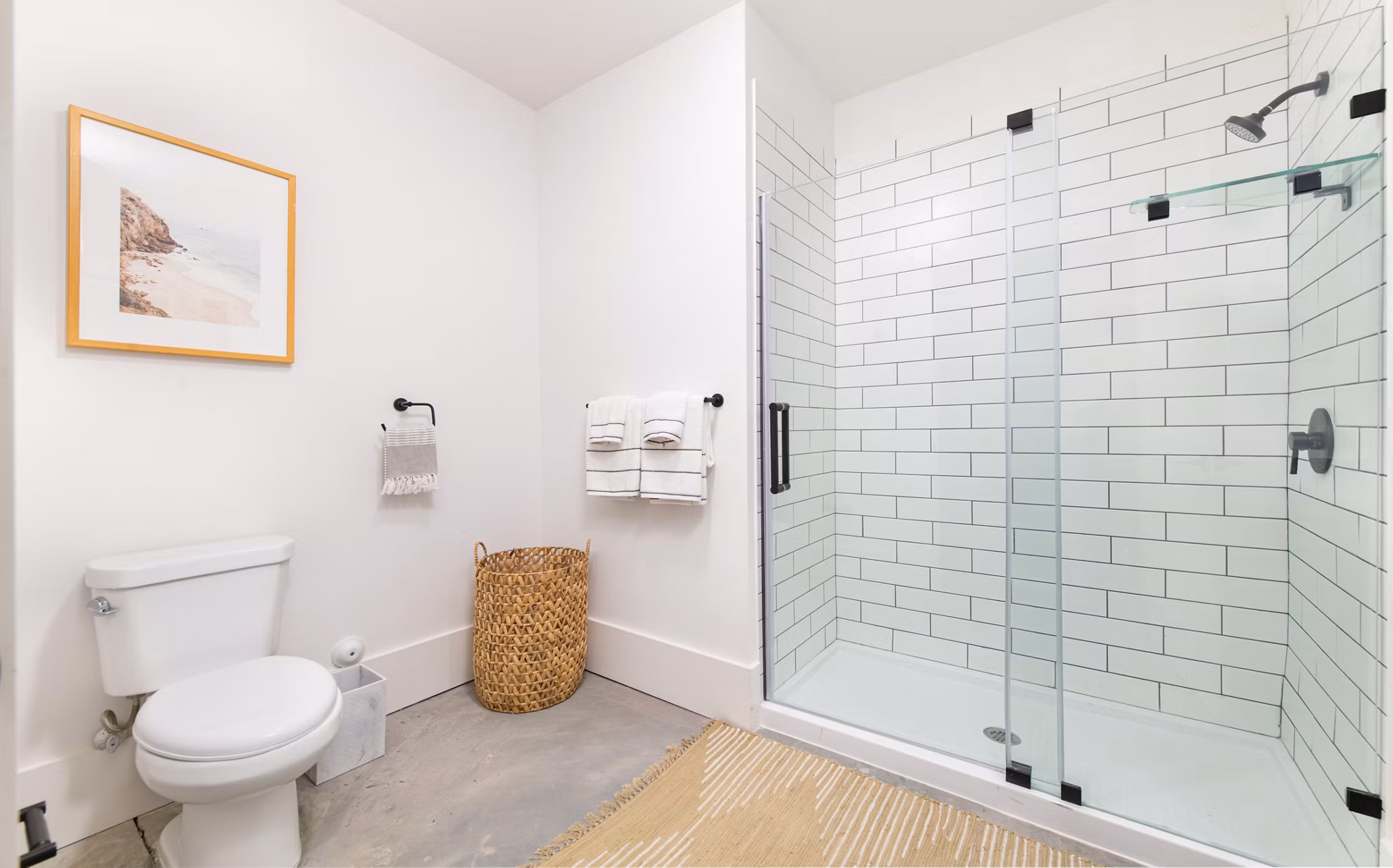 Spacious bathroom with modern fixtures at The Lofts at Woodside Mill Apartments