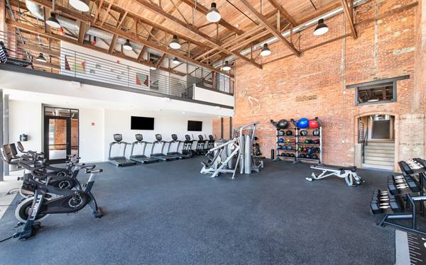 fitness center at The Lofts at Woodside Mill Apartments