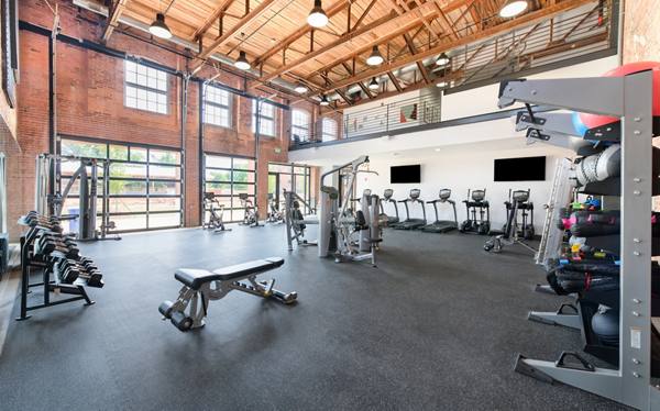 fitness center at The Lofts at Woodside Mill Apartments