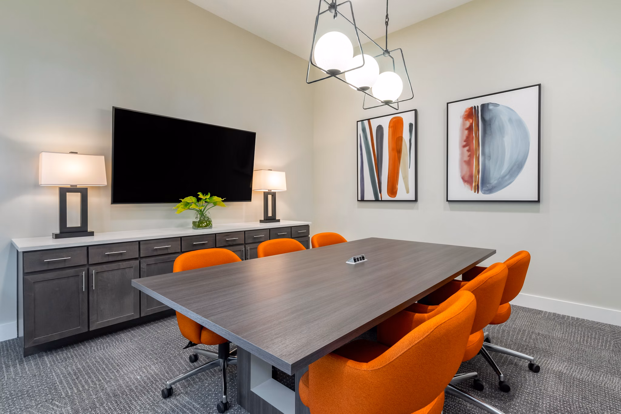 Modern meeting facility with sleek design at Lago Apartments, ideal for business gatherings and presentations