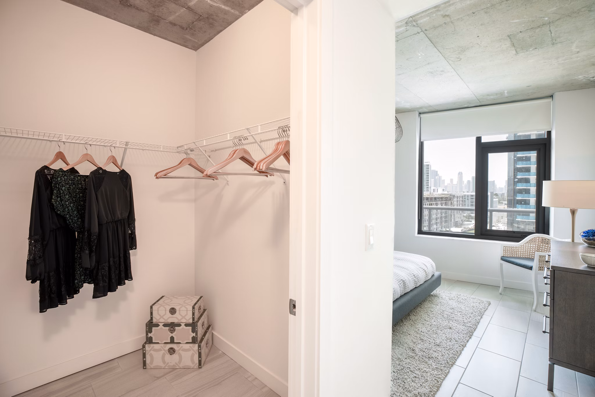 Walk-in closet with custom shelving at Midtown 5 Apartments