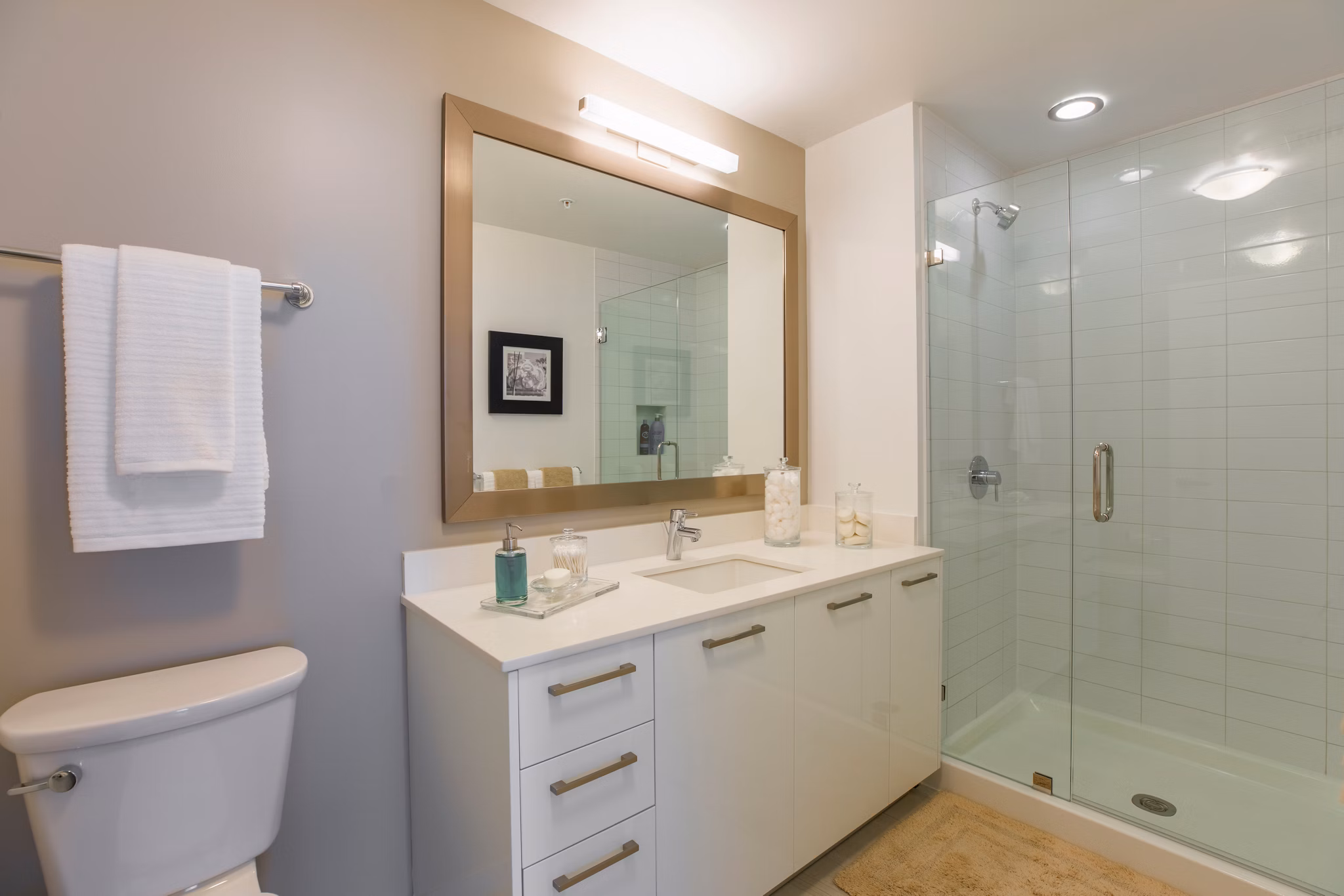 Midtown 5 Apartments: Elegant bathroom with modern fixtures and marble countertops in luxury apartment