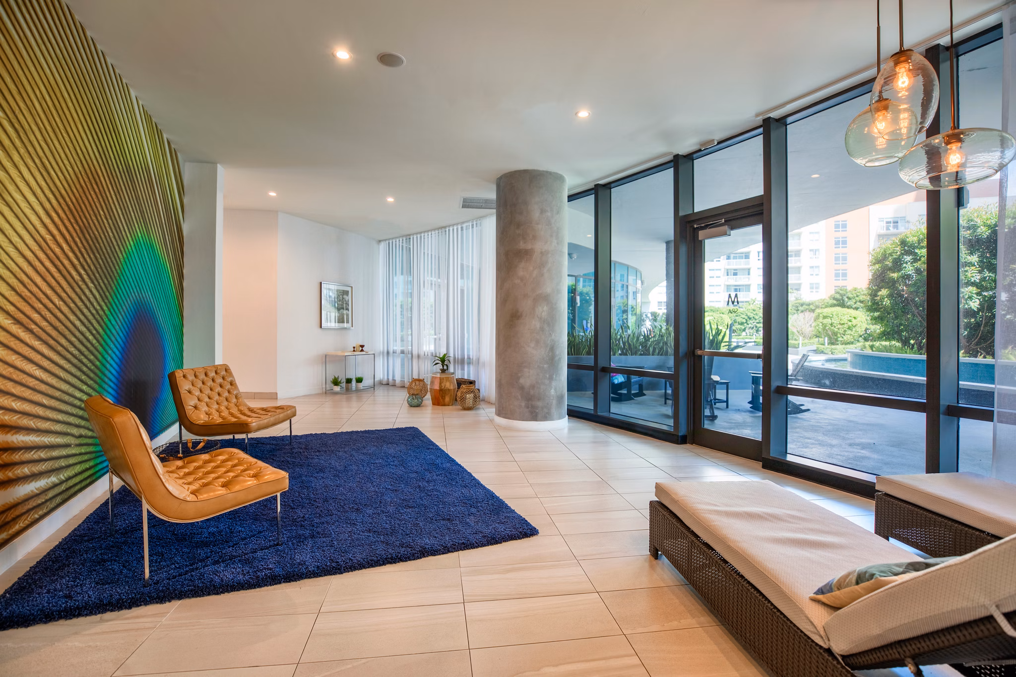 Clubhouse featuring modern decor and ample seating at Midtown 5 Apartments in Miami
