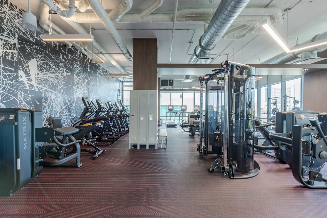 State-of-the-art fitness center with modern equipment at Midtown 5 Apartments