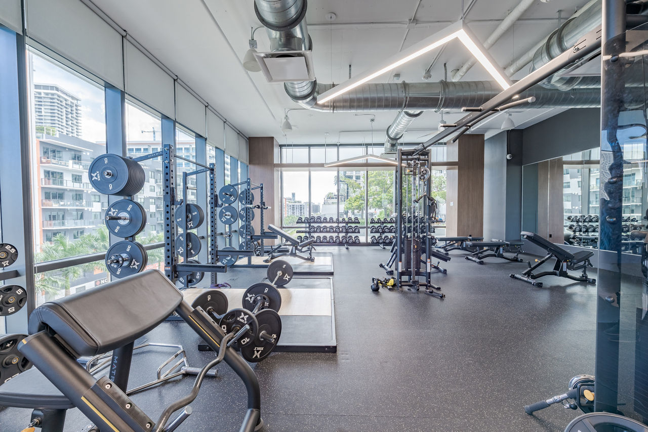 Yoga and spin studio with modern equipment at Midtown 5 Apartments