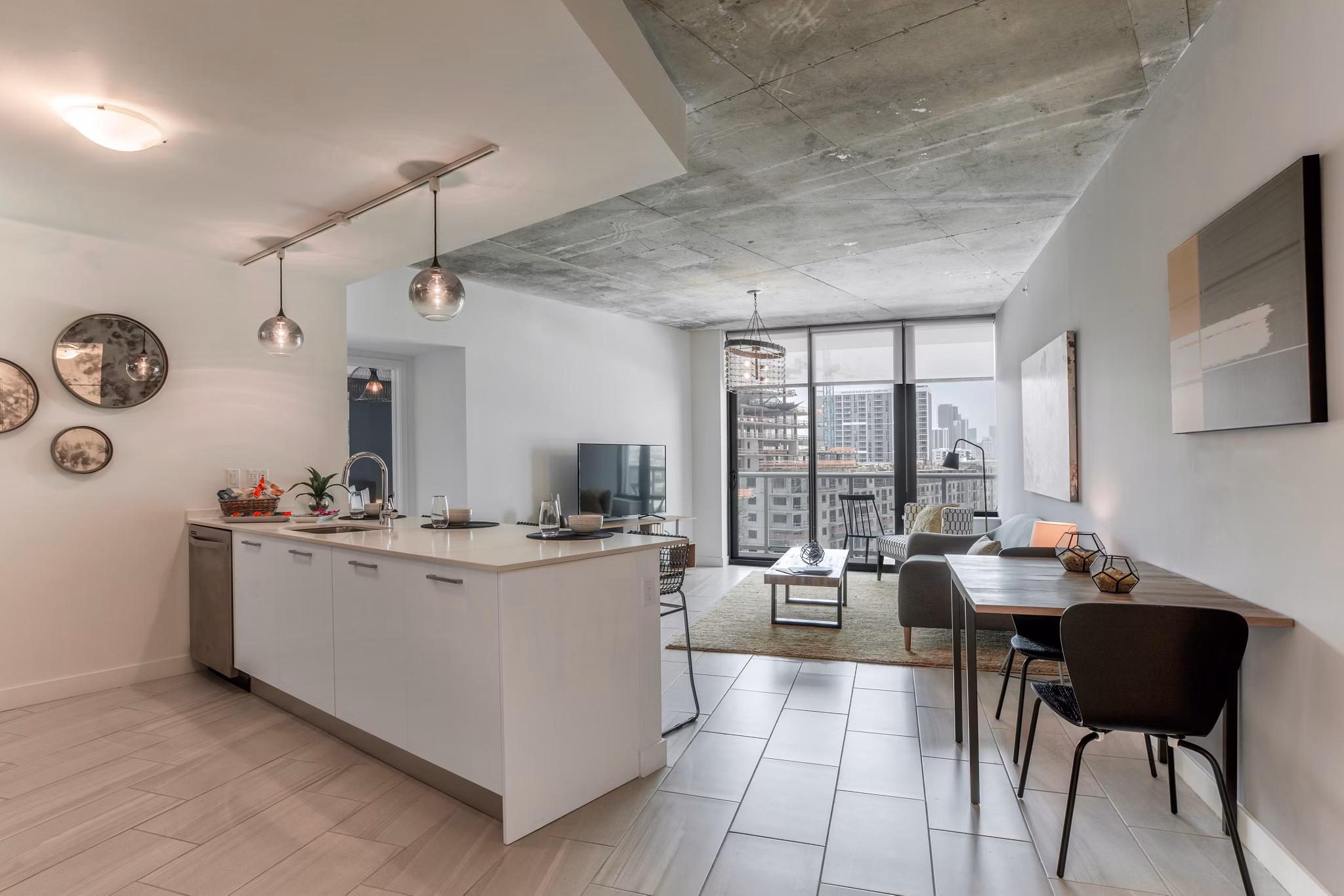 Modern kitchen featuring stainless steel appliances at Midtown 5 Apartments in Miami