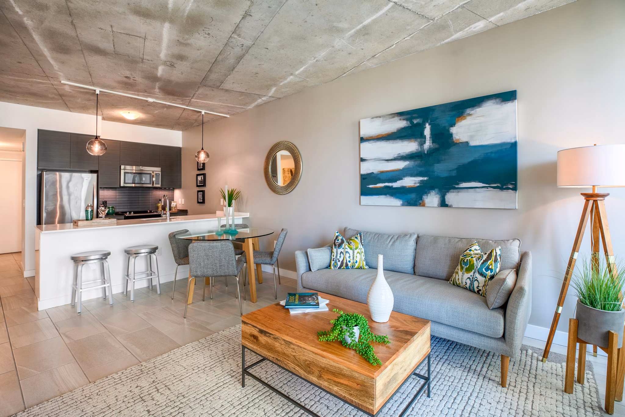 Modern living room with stylish furnishings and large windows at Midtown 5 Apartments, offering luxurious city living