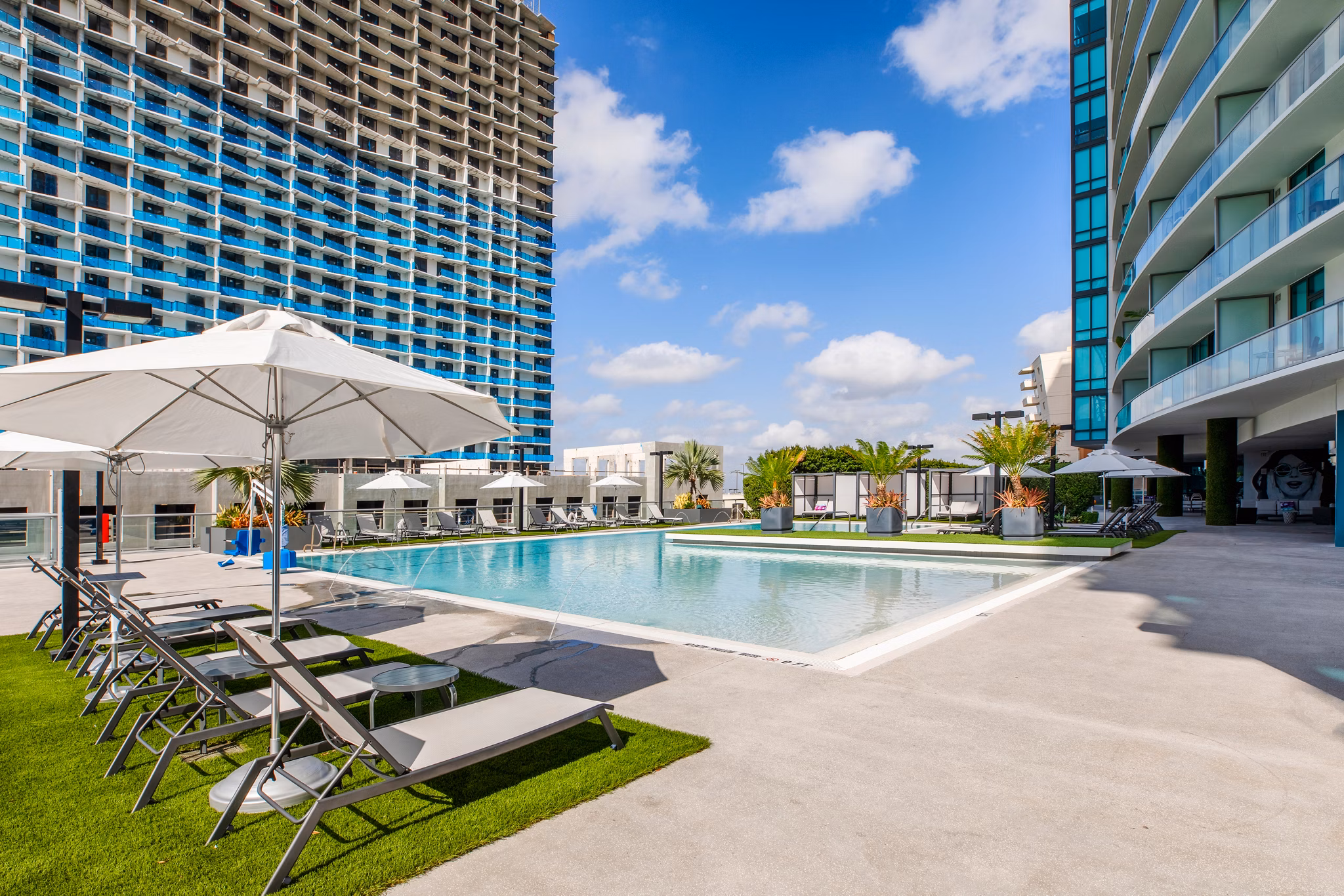 Rooftop pool with Miami skyline views at Midtown 5 Apartments, luxury living in the heart of the city