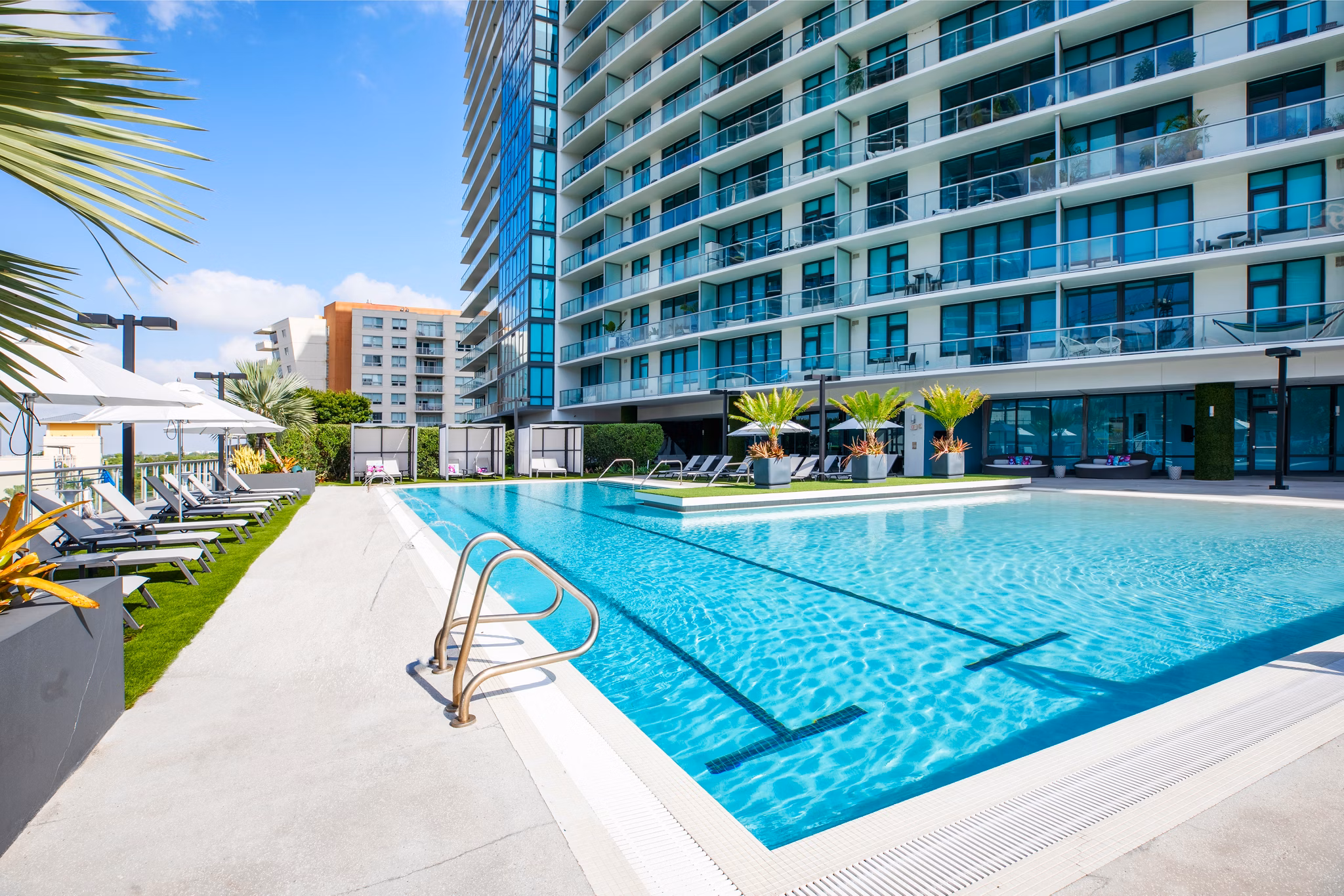 Infinity pool with skyline views at Midtown 5 Apartments