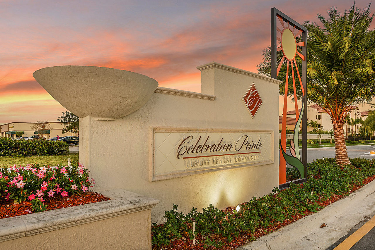 Celebration Pointe Apartments: Modern signage at luxury community entrance
