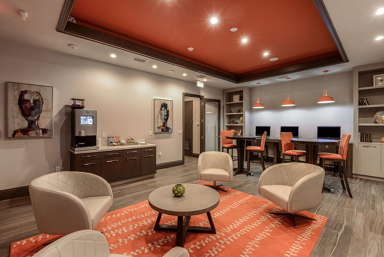 Business center with computer stations at Celebration Pointe Apartments