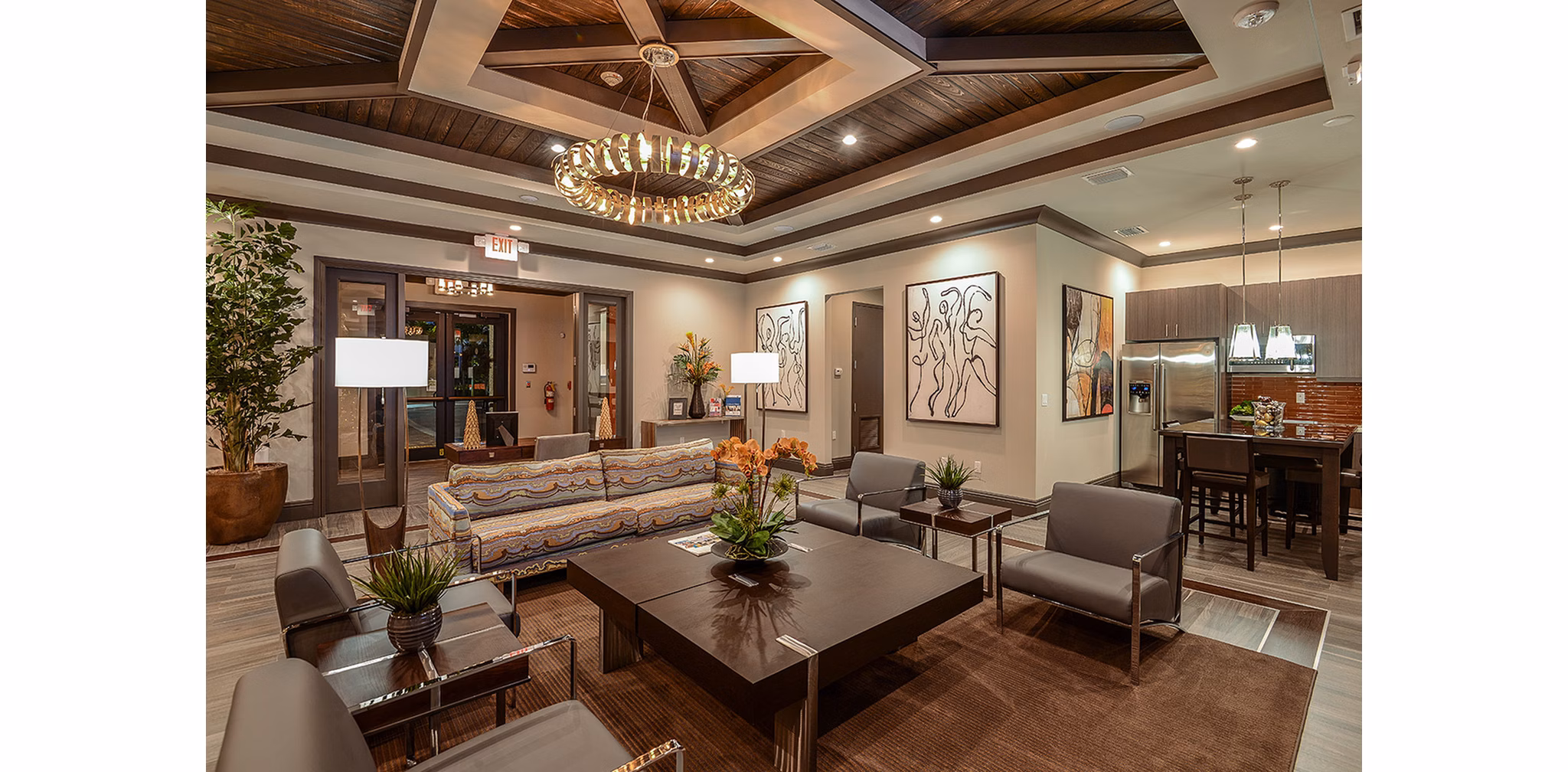 Modern clubhouse with stylish seating and entertainment facilities at Celebration Pointe Apartments, ideal for social gatherings and community events