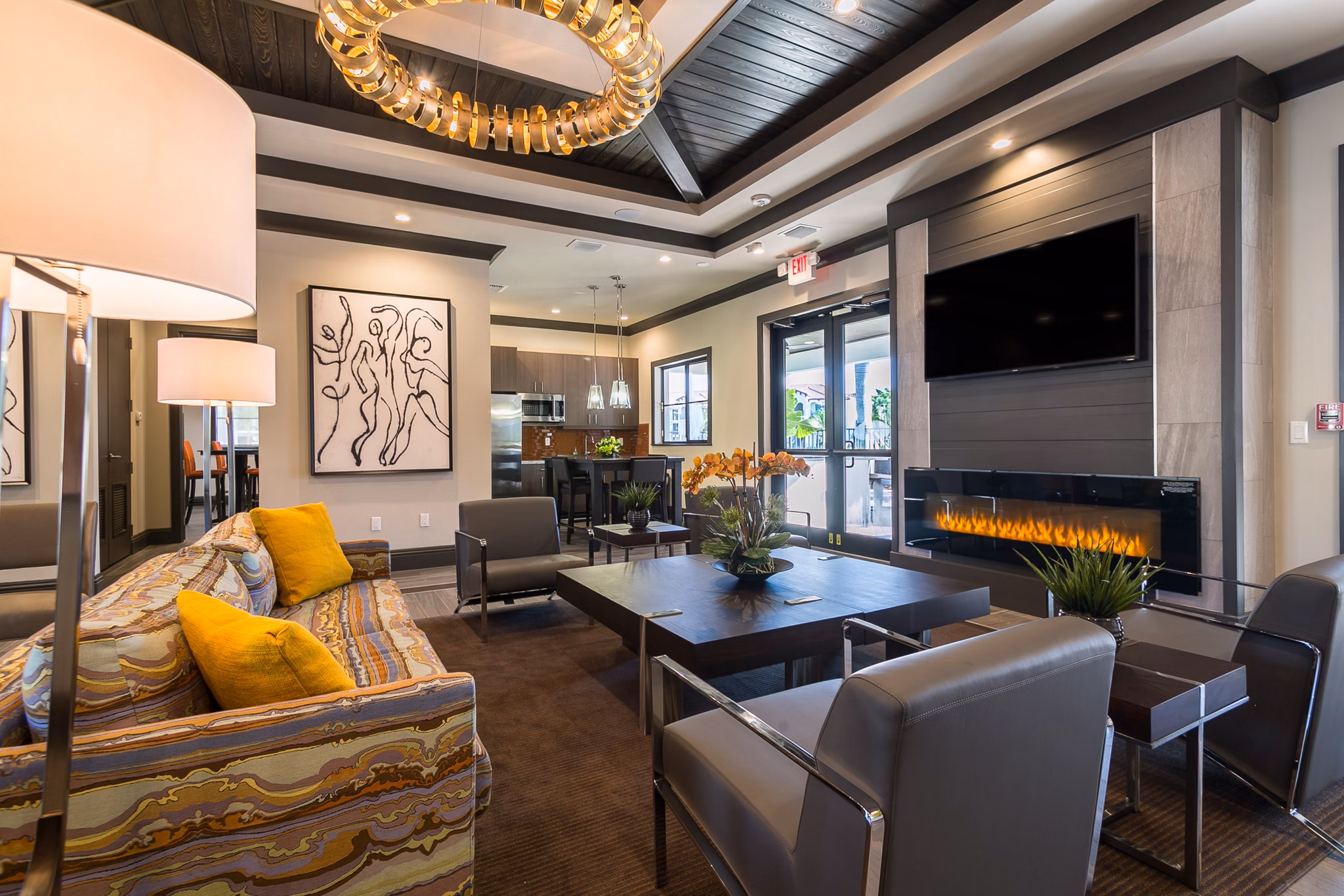 Celebration Pointe Apartments: Cozy clubhouse featuring modern design and comfortable seating areas