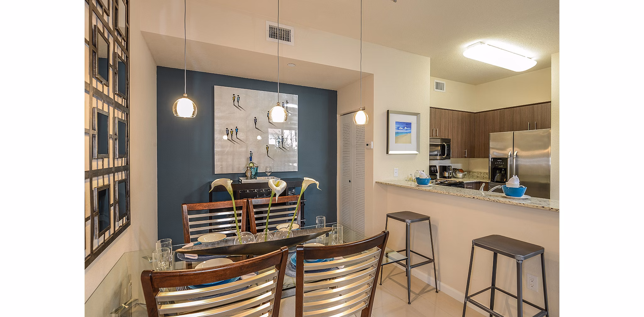 Elegant dining area with modern decor at Celebration Pointe Apartments