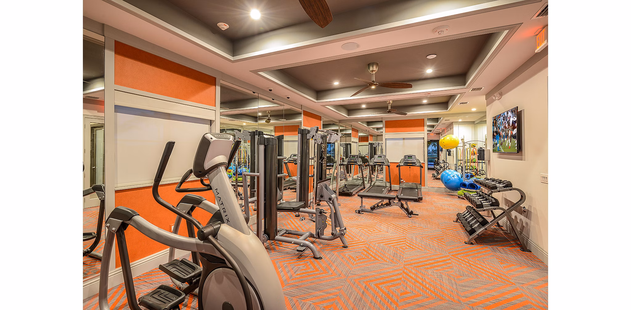 Fitness center with modern equipment at Celebration Pointe Apartments