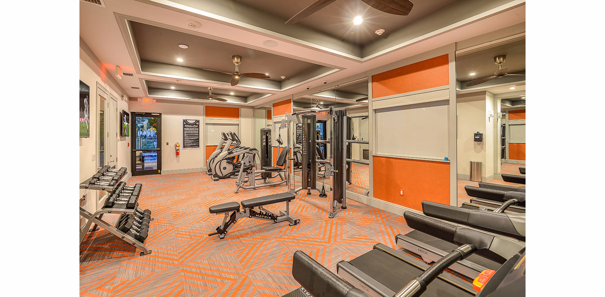 State-of-the-art fitness center with modern equipment at Celebration Pointe Apartments