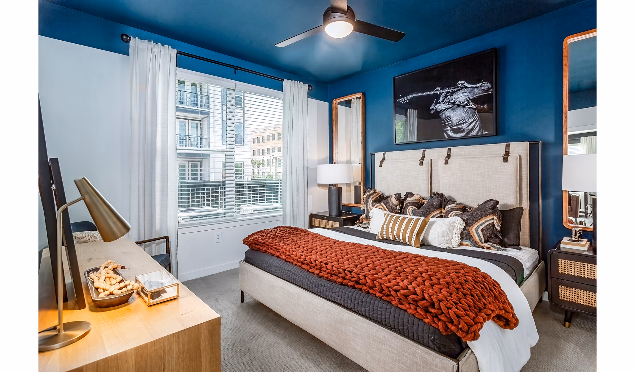 Cozy bedroom with modern design at The Monty Apartments