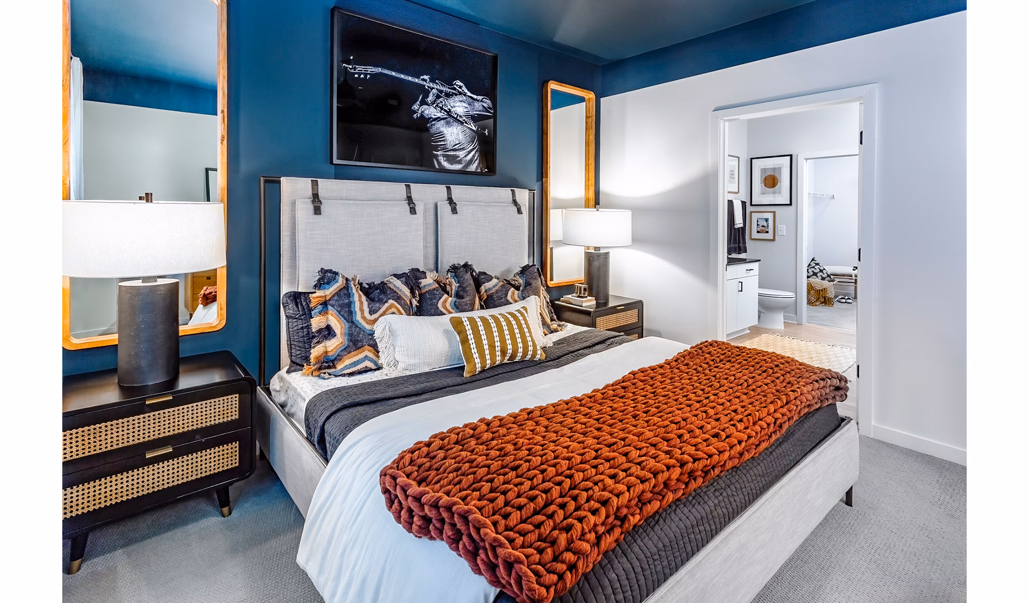 Modern bedroom with stylish decor at The Monty Apartments, a Greystar luxury property