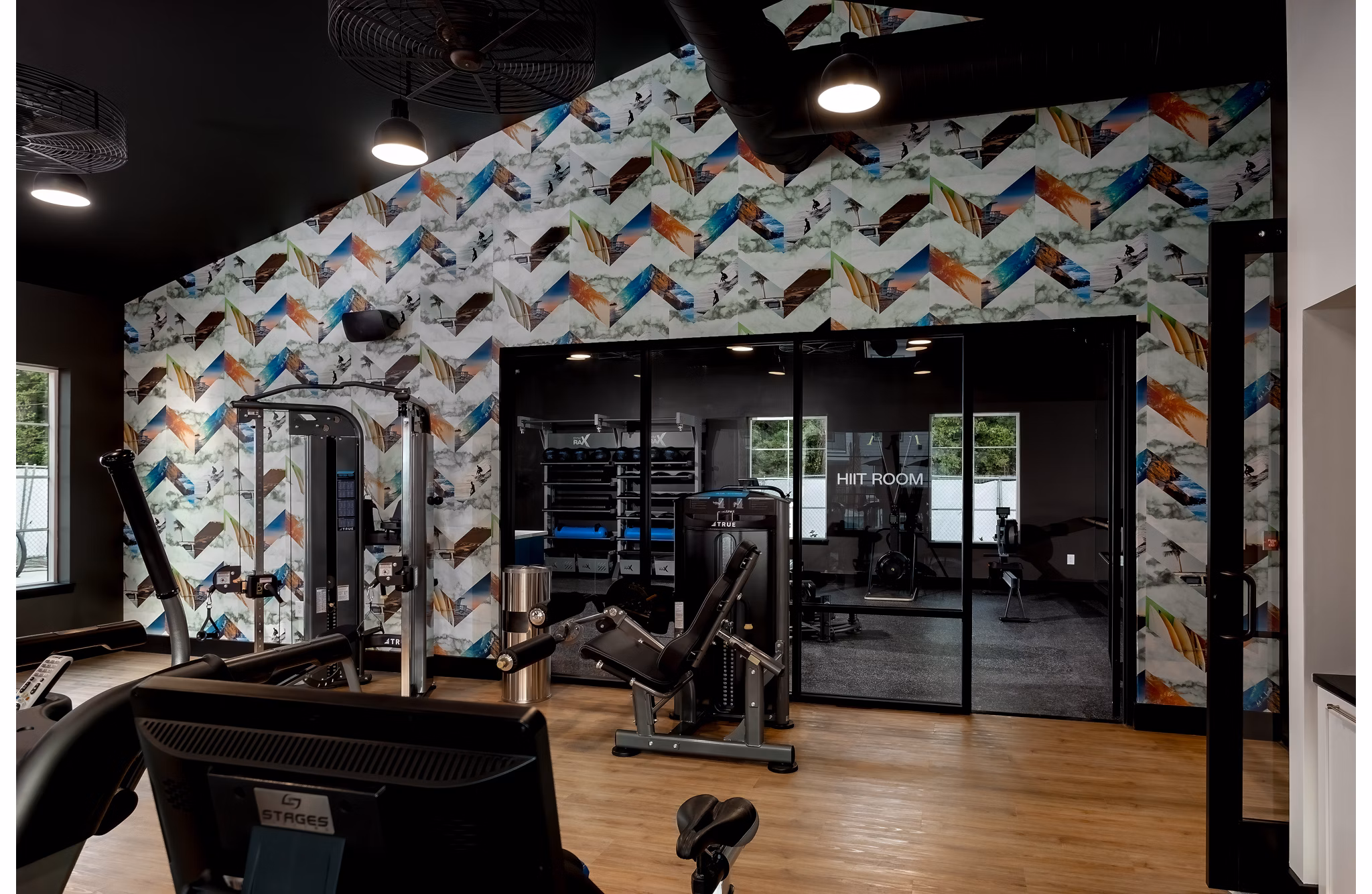 The Monty Apartments: Modern fitness center with state-of-the-art equipment, promoting health and wellness in a luxury community setting