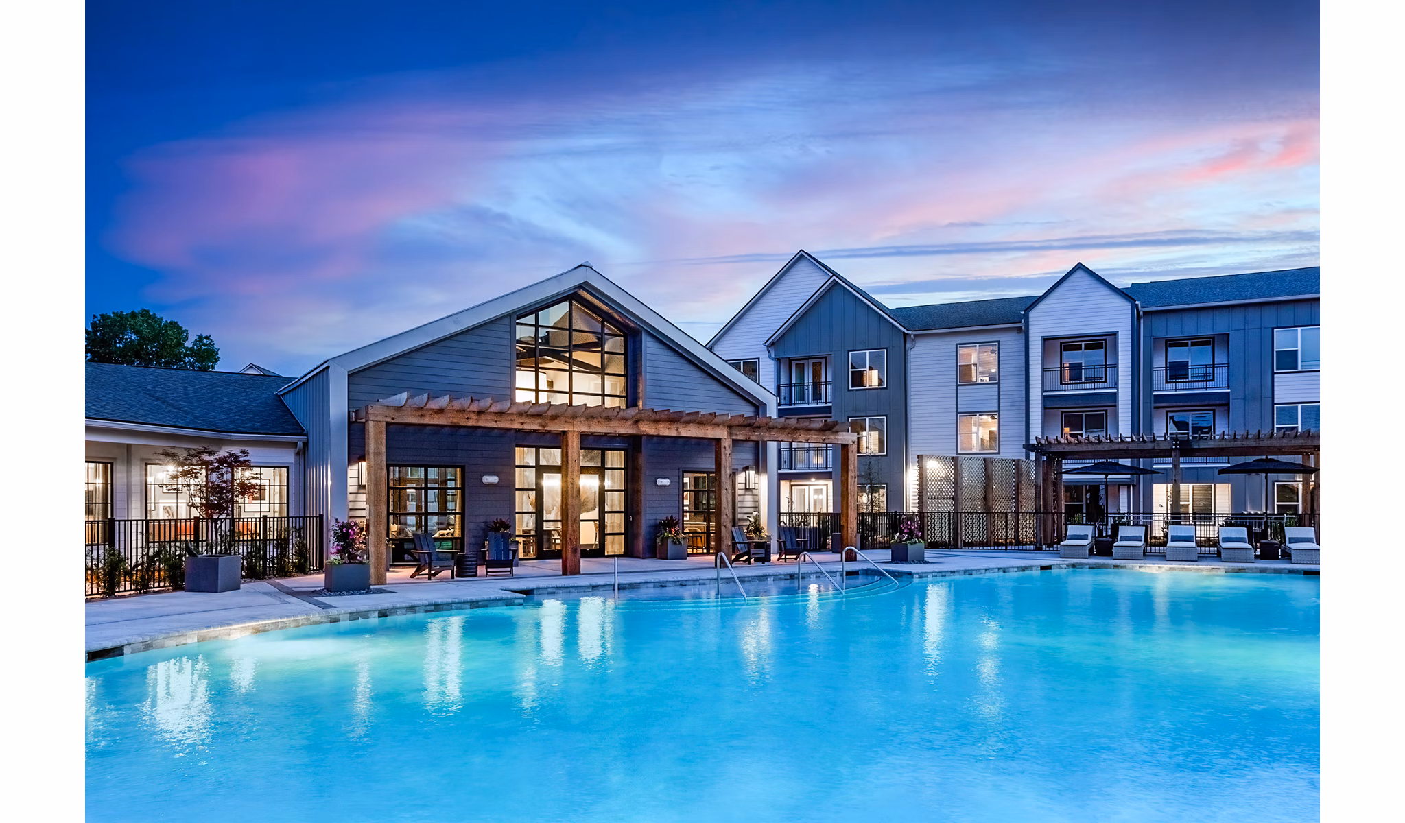 Luxurious pool with sun deck at The Monty Apartments, offering a relaxing oasis in a vibrant community