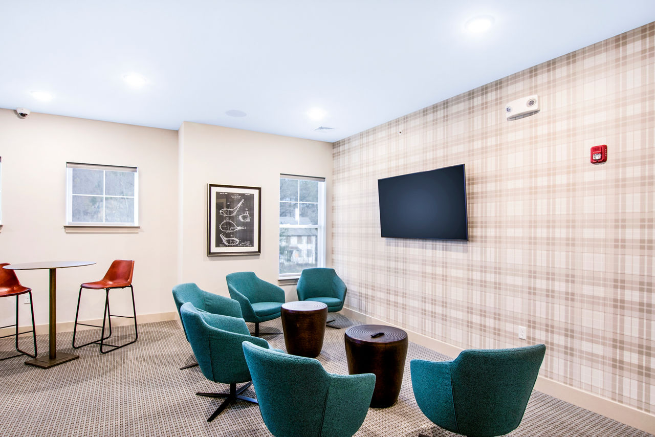 Clubhouse featuring modern design elements at Woodgrove at Sterlington Apartments Luxury living with premium amenities and stylish interiors