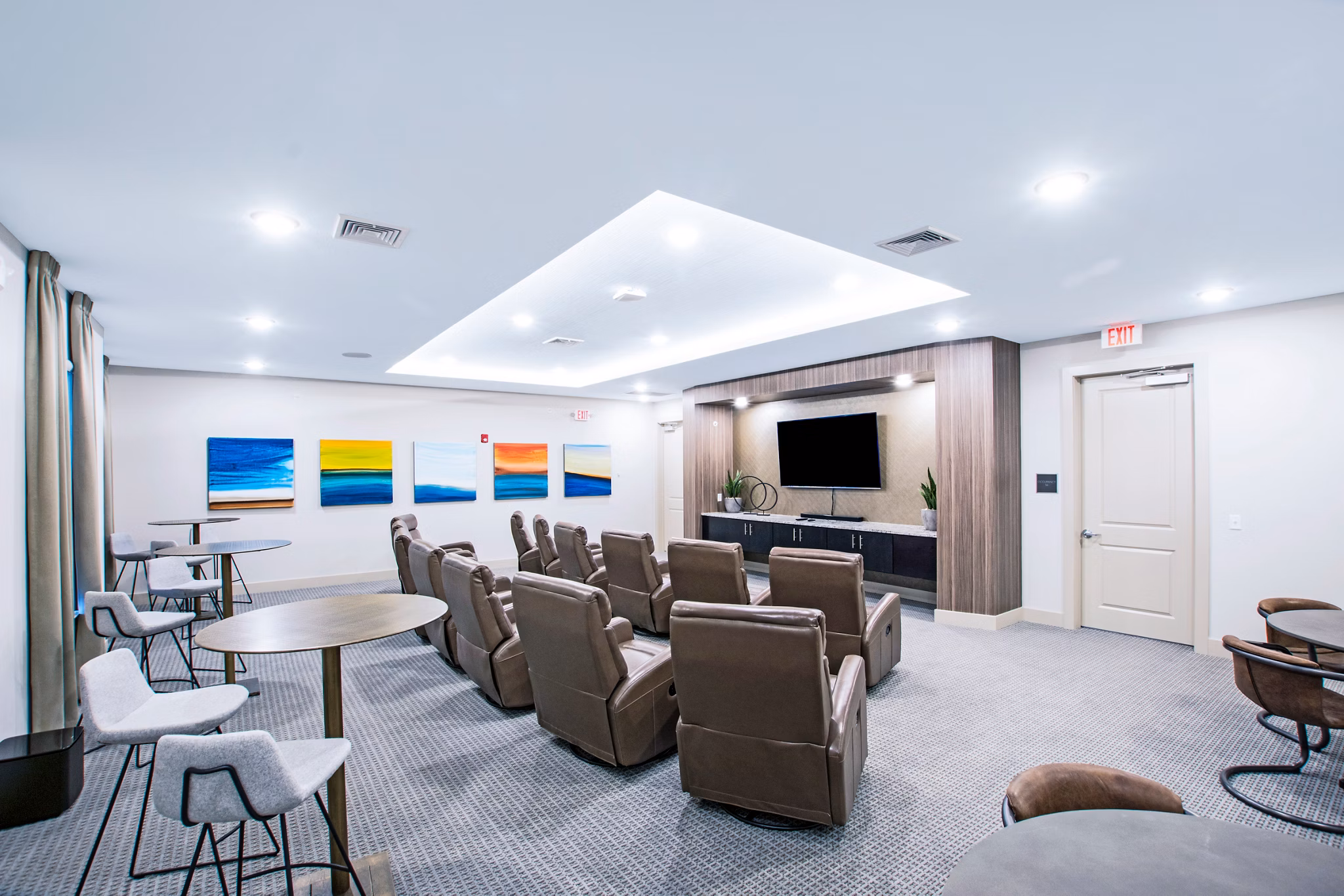Theater room with comfortable seating at Woodgrove at Sterlington Apartments