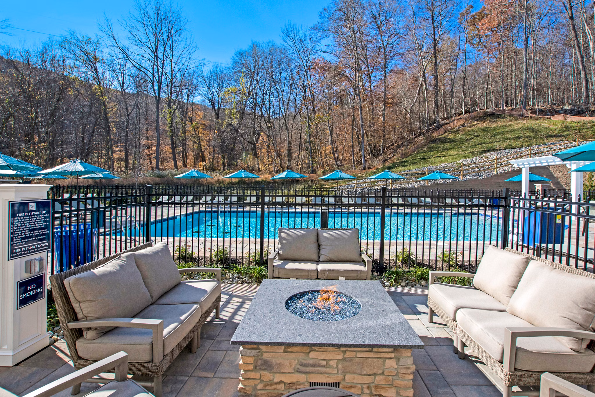 Cozy outdoor fire pit at Woodgrove at Sterlington Apartments