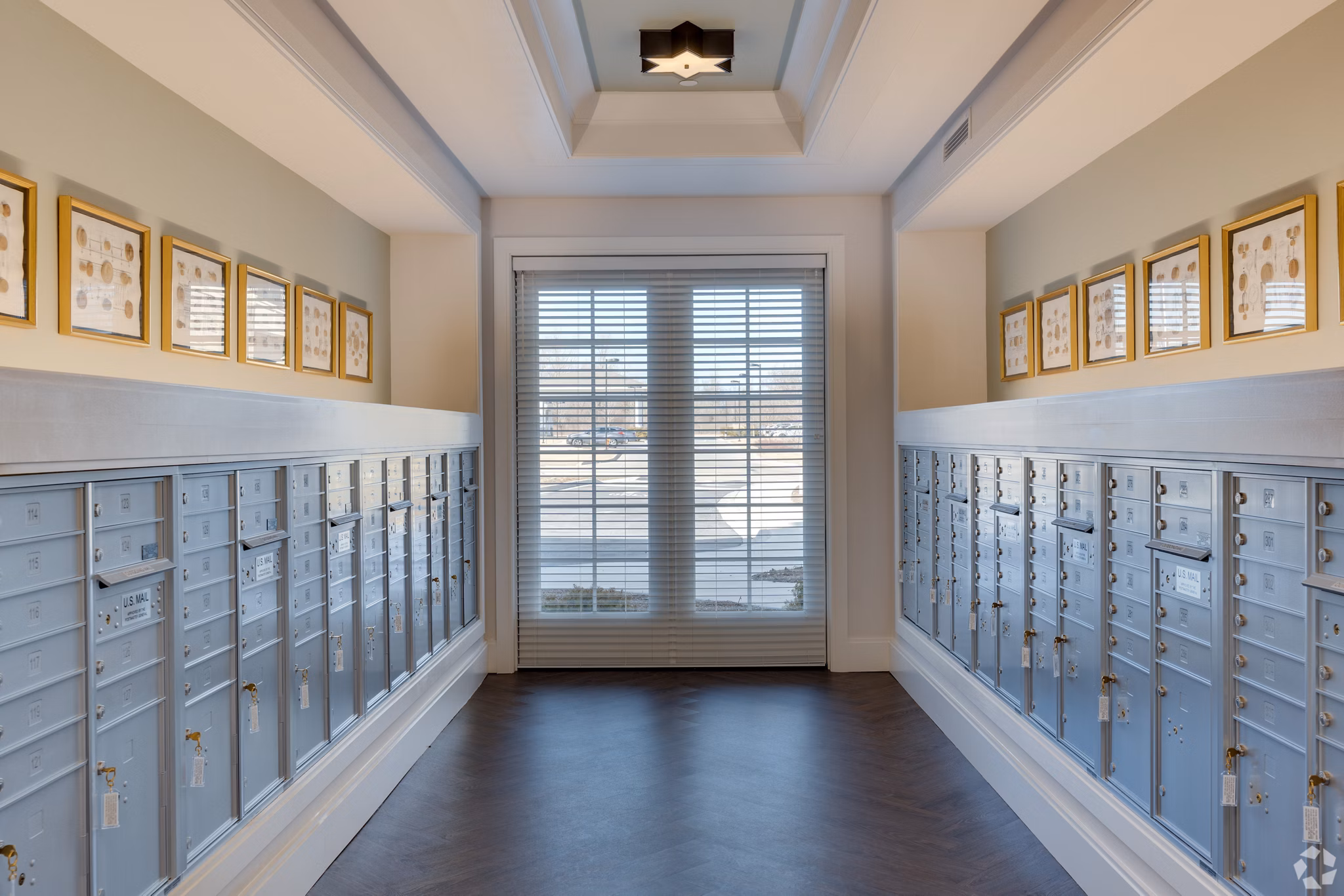Mail room with secure package lockers at Avenida Naperville Apartments