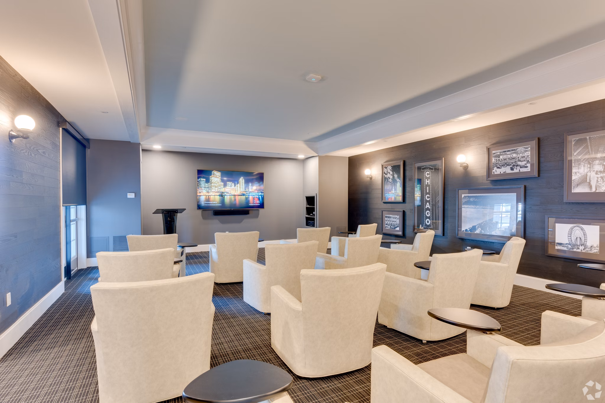 Stylish theater room with plush seating at Avenida Naperville Apartments, ideal for movie nights and entertainment events