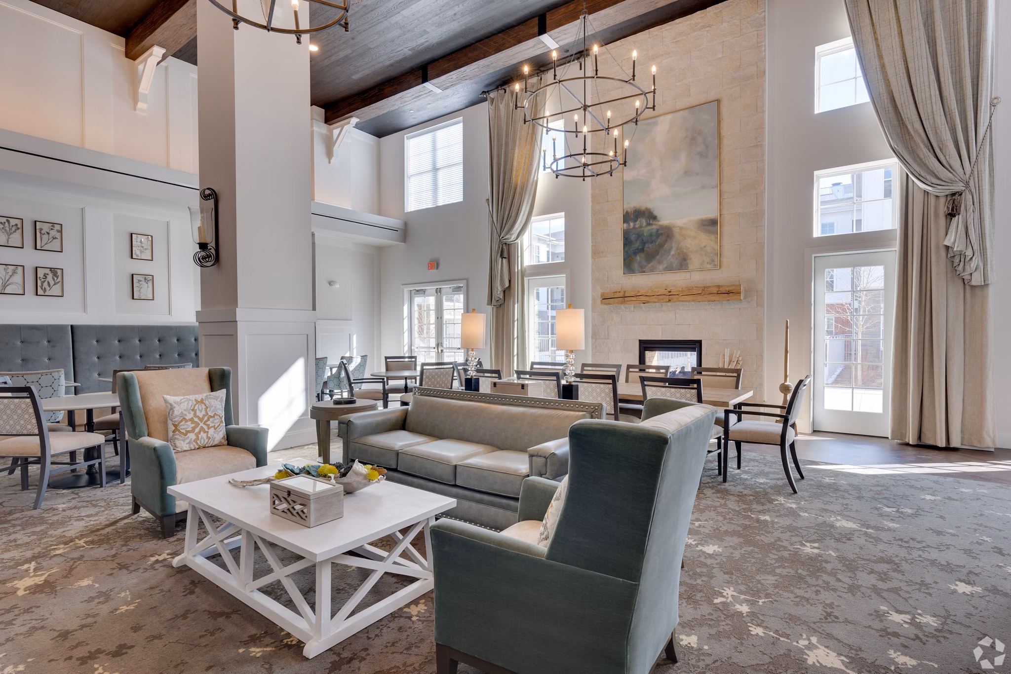 Clubhouse featuring modern design and spacious seating at Avenida Naperville Apartments