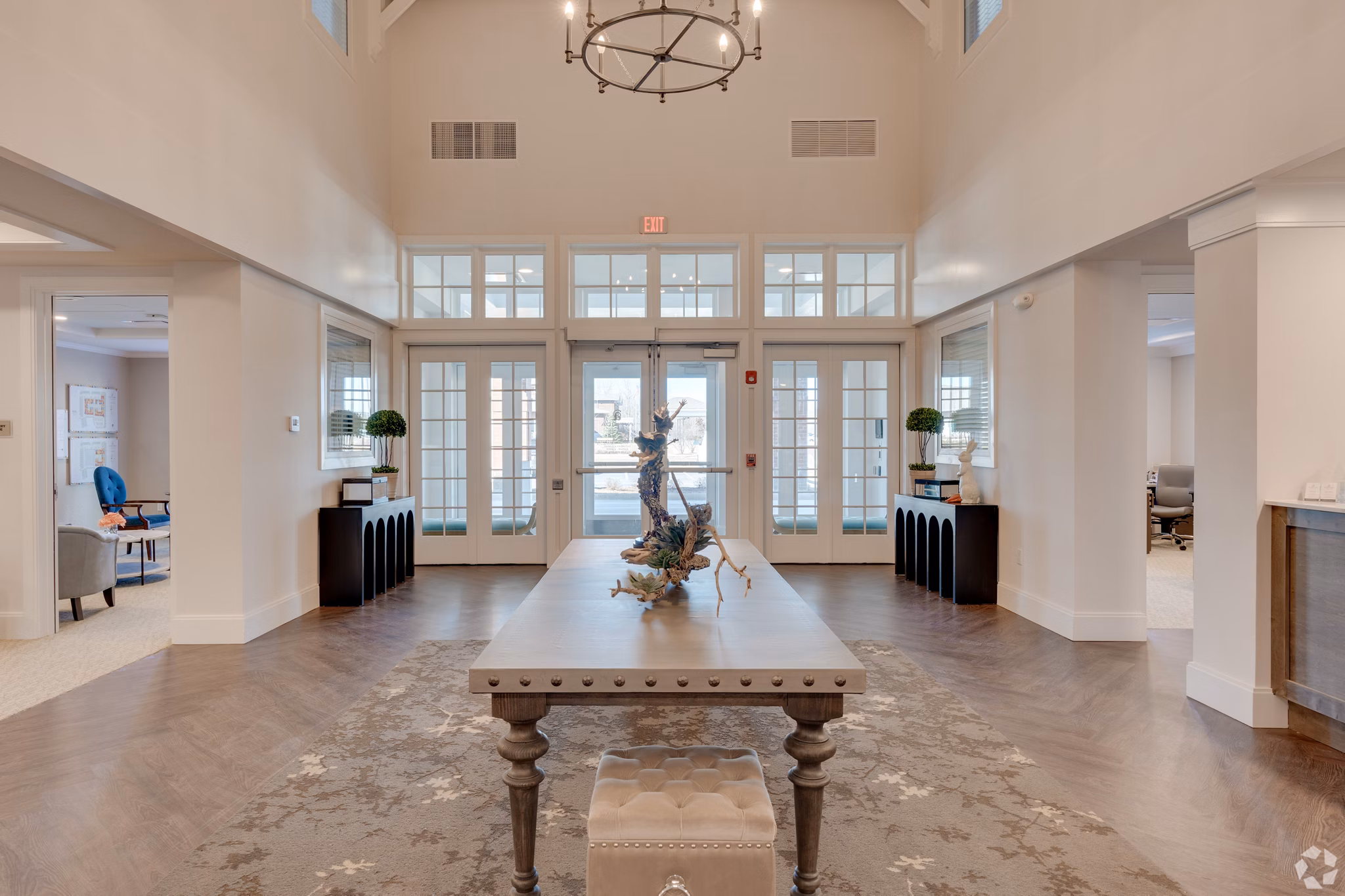 Clubhouse with modern design and ample seating at Avenida Naperville luxury apartments