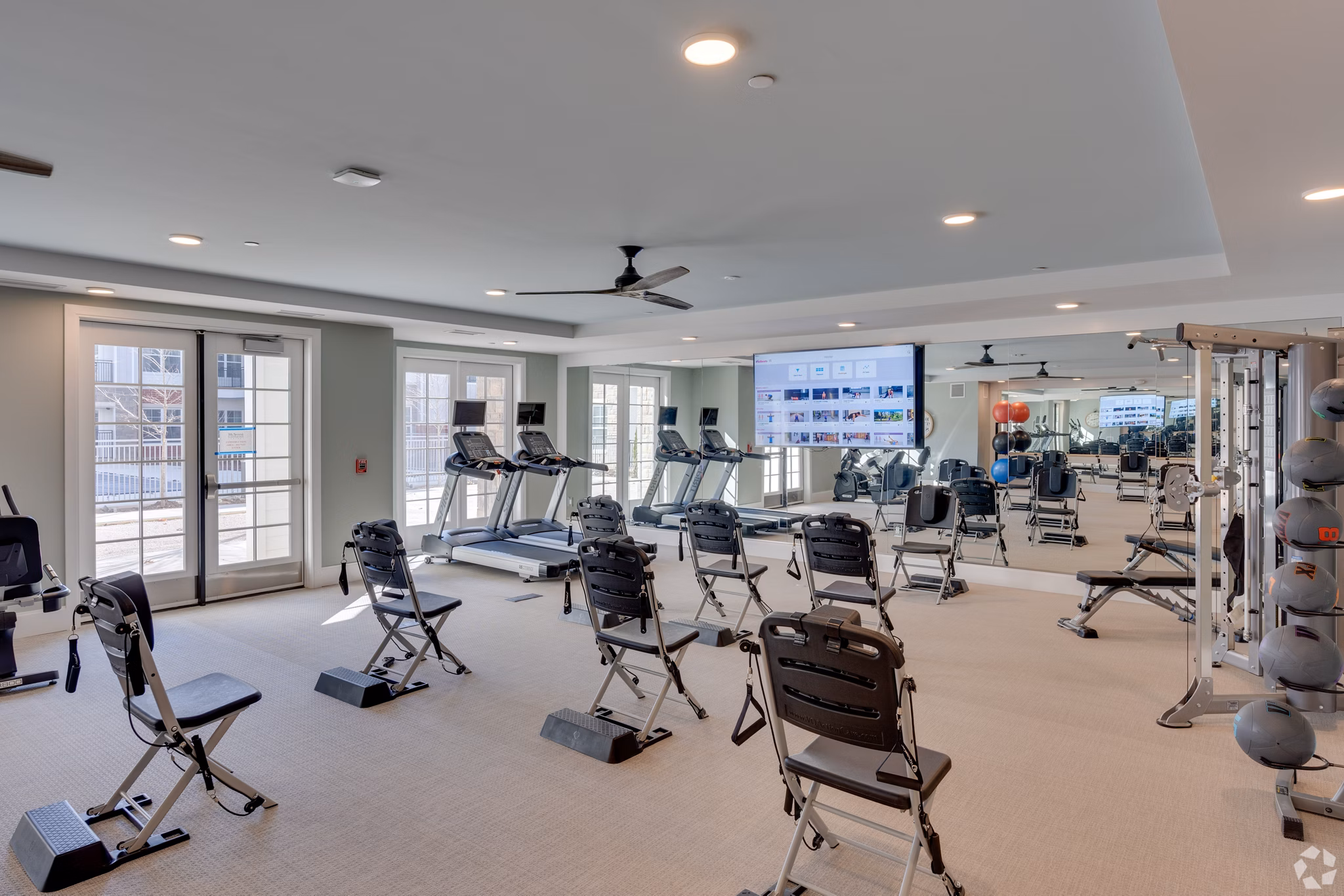 State-of-the-art fitness center with modern equipment at Avenida Naperville Apartments