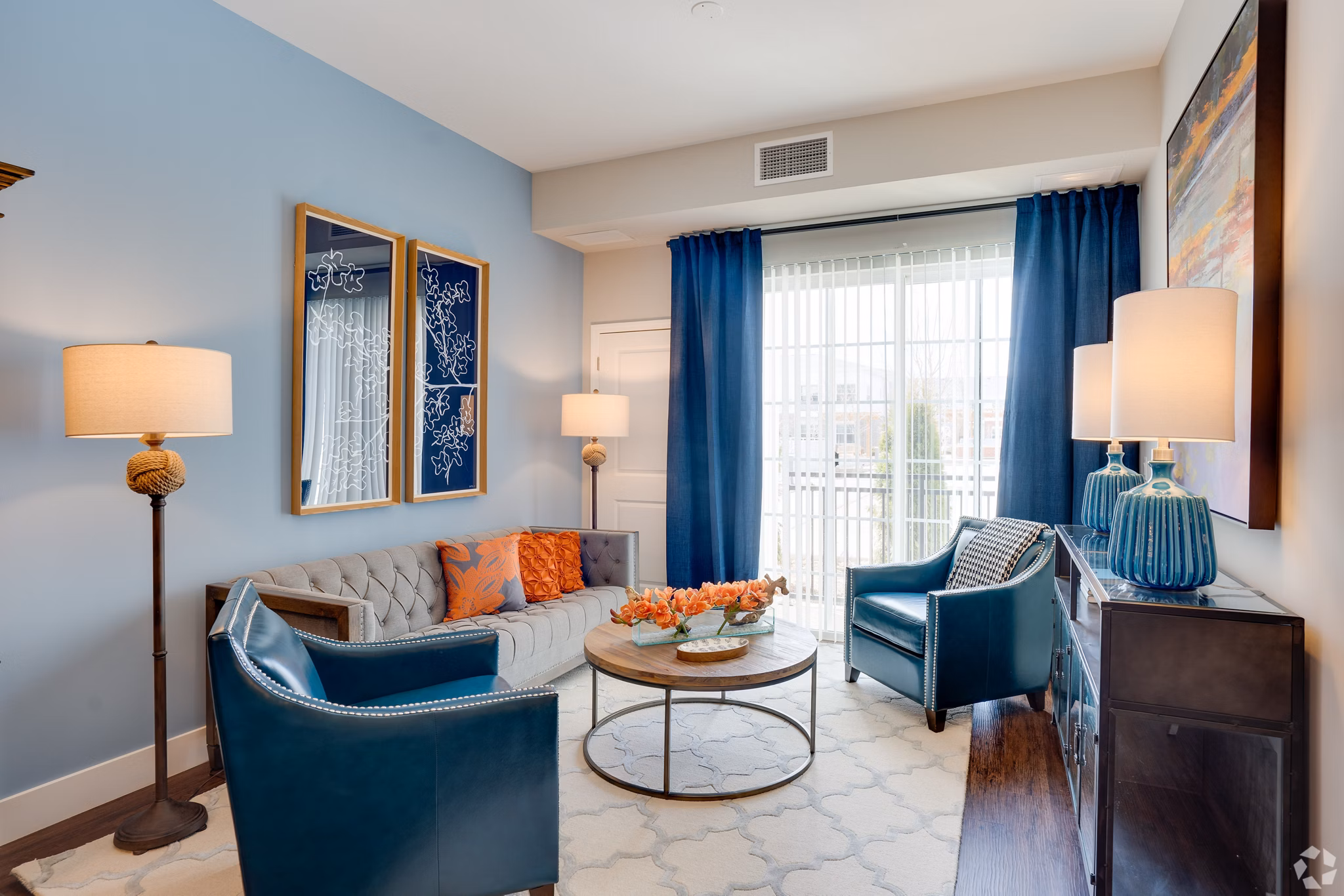Spacious living room featuring modern decor in Avenida Naperville Apartments