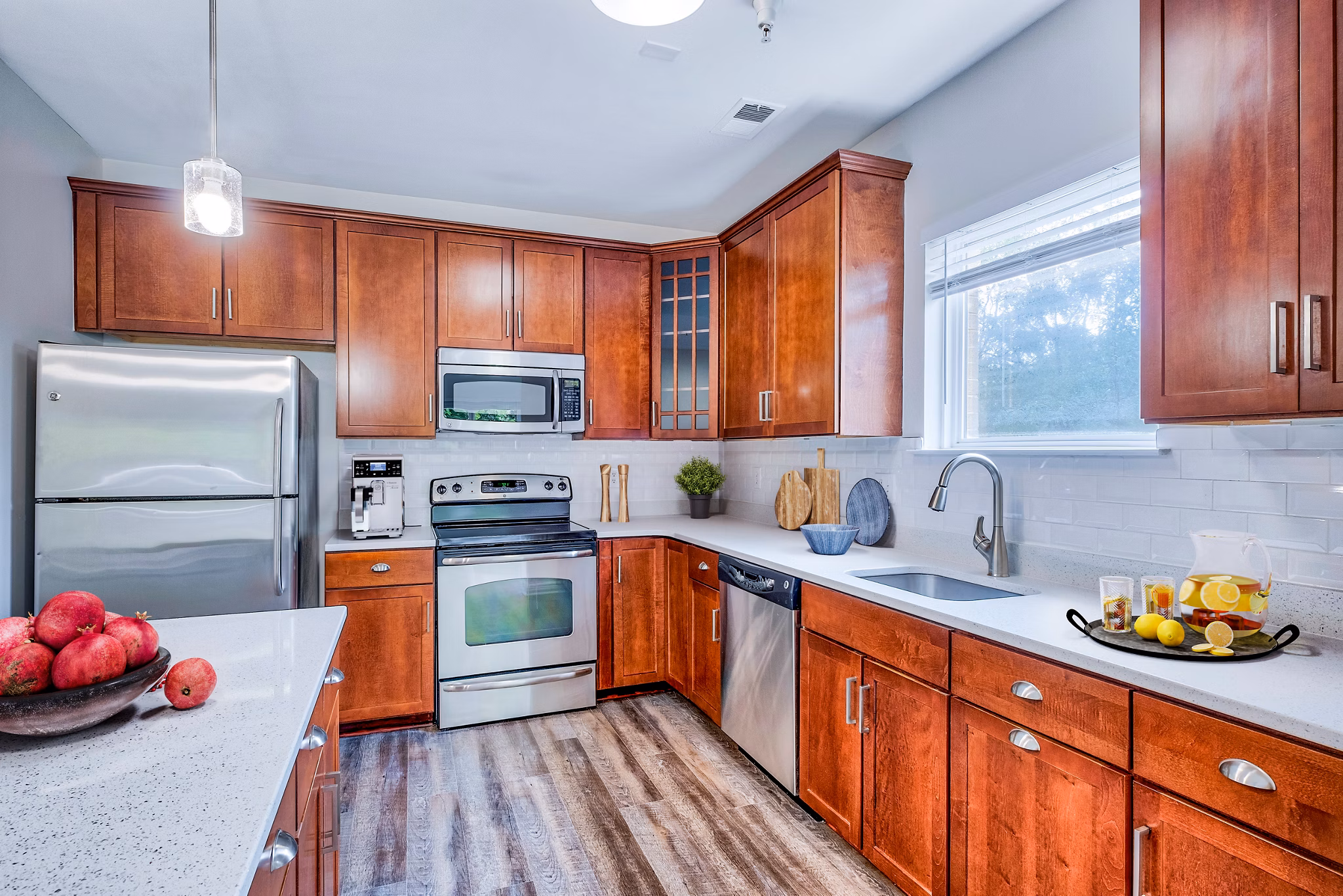 Modern kitchen with stainless steel appliances in Mosaic at Largo Station Apartments Perfect for gourmet cooking and entertaining guests