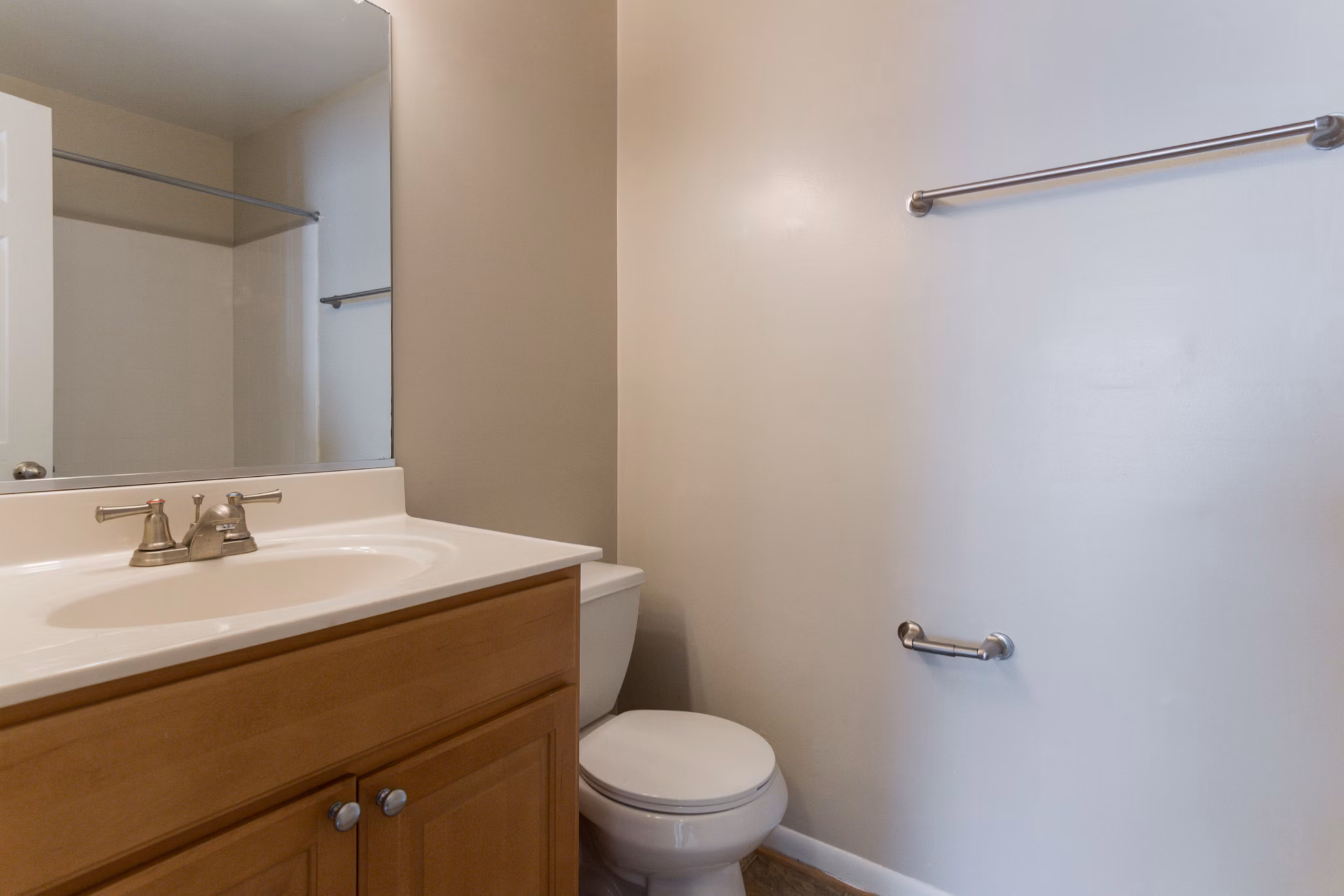 Stylish bathroom featuring modern fixtures and sleek design at Avana Oak Mill Apartments