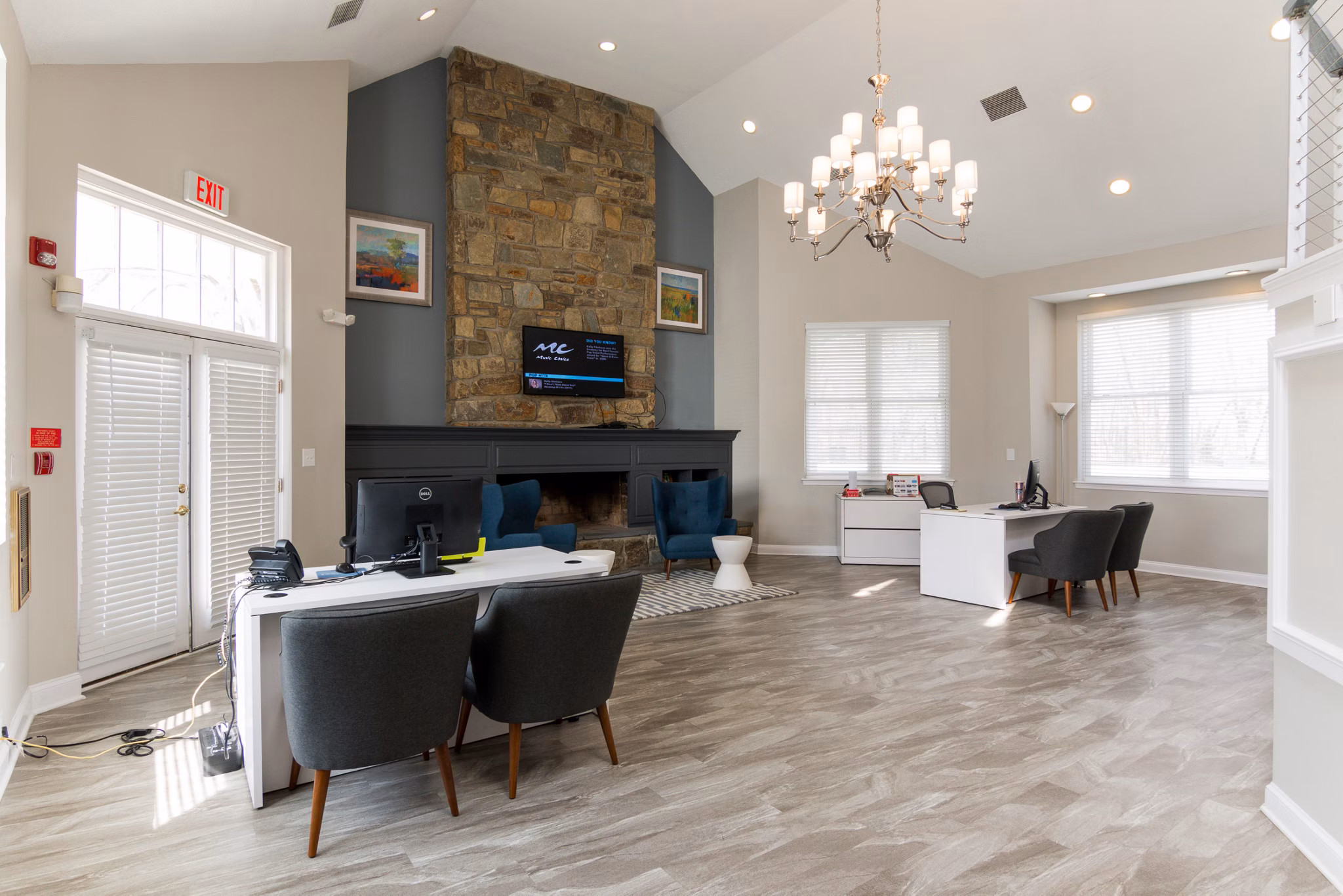 Elegant clubhouse featuring modern decor and seating at Avana Oak Mill Apartments