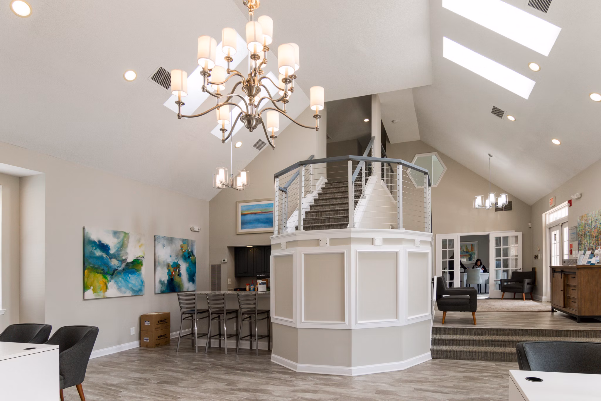Clubhouse featuring modern amenities and elegant design at Avana Oak Mill Apartments