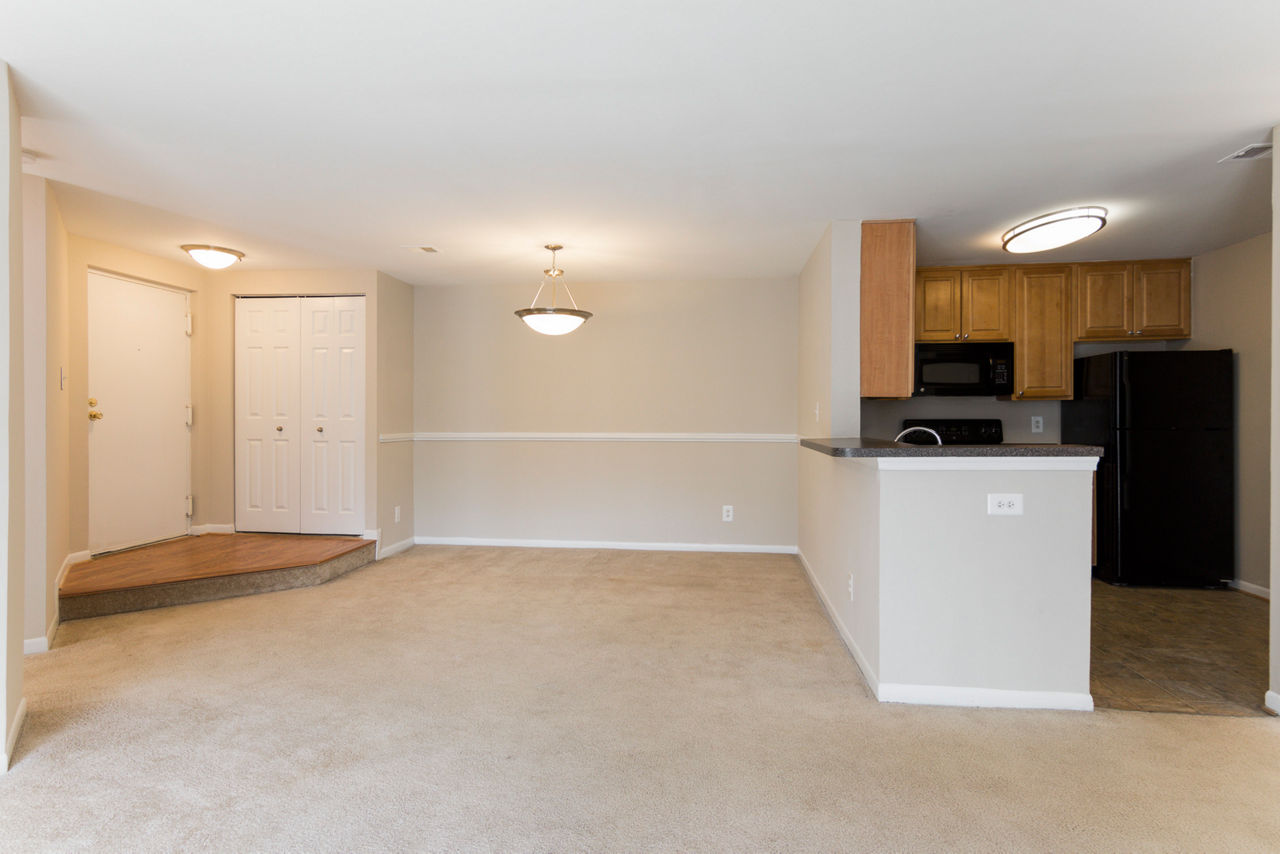 Elegant dining area with contemporary decor in Avana Oak Mill Apartments, perfect for entertaining and luxury living