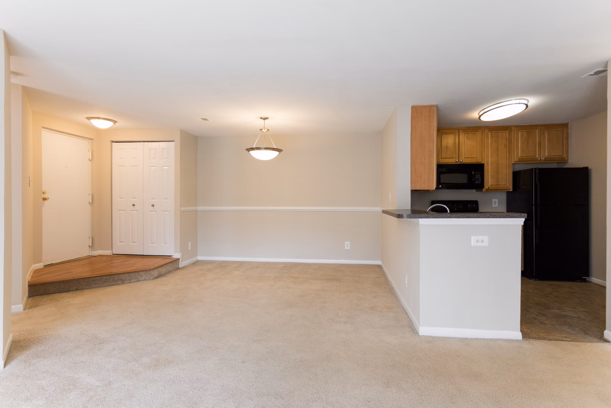 Elegant dining area with contemporary decor in Avana Oak Mill Apartments, perfect for entertaining and luxury living