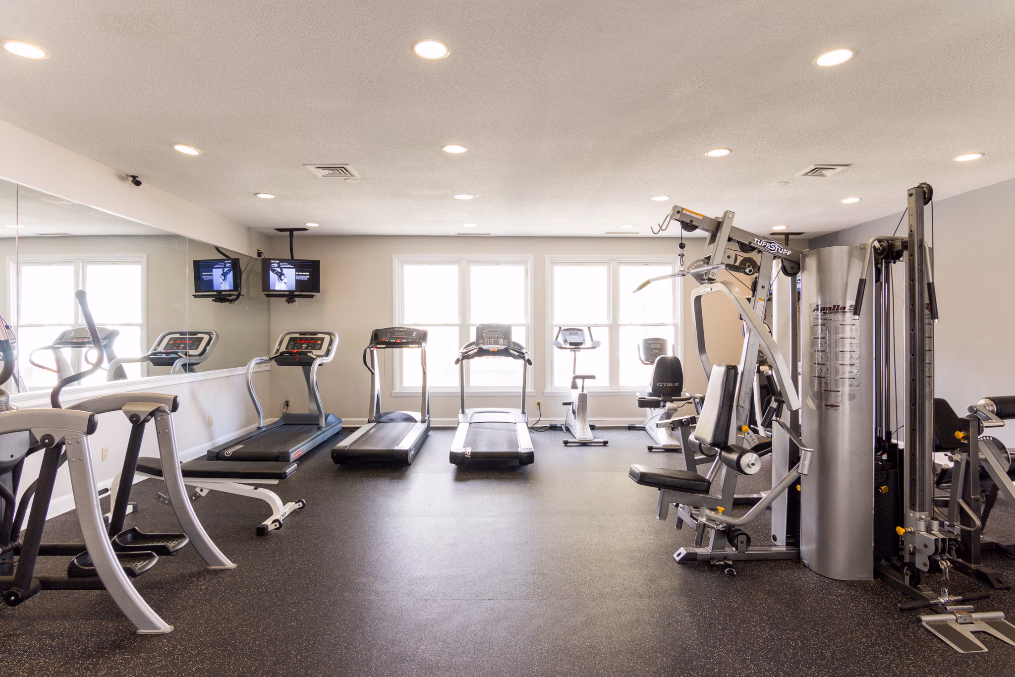 Modern fitness center with state-of-the-art equipment at Avana Oak Mill Apartments, ideal for a luxurious lifestyle