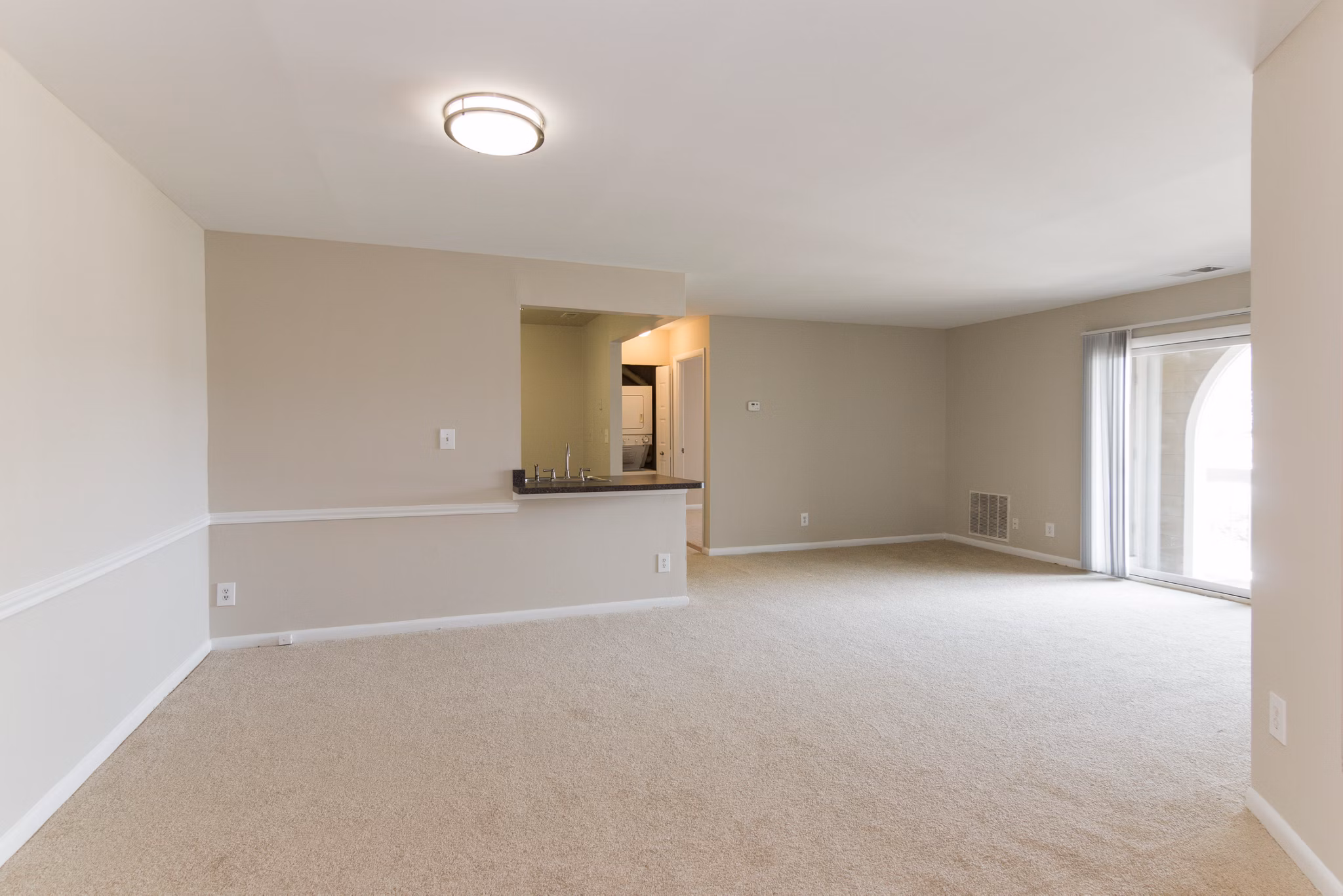 Modern living room with stylish decor at Avana Oak Mill Apartments