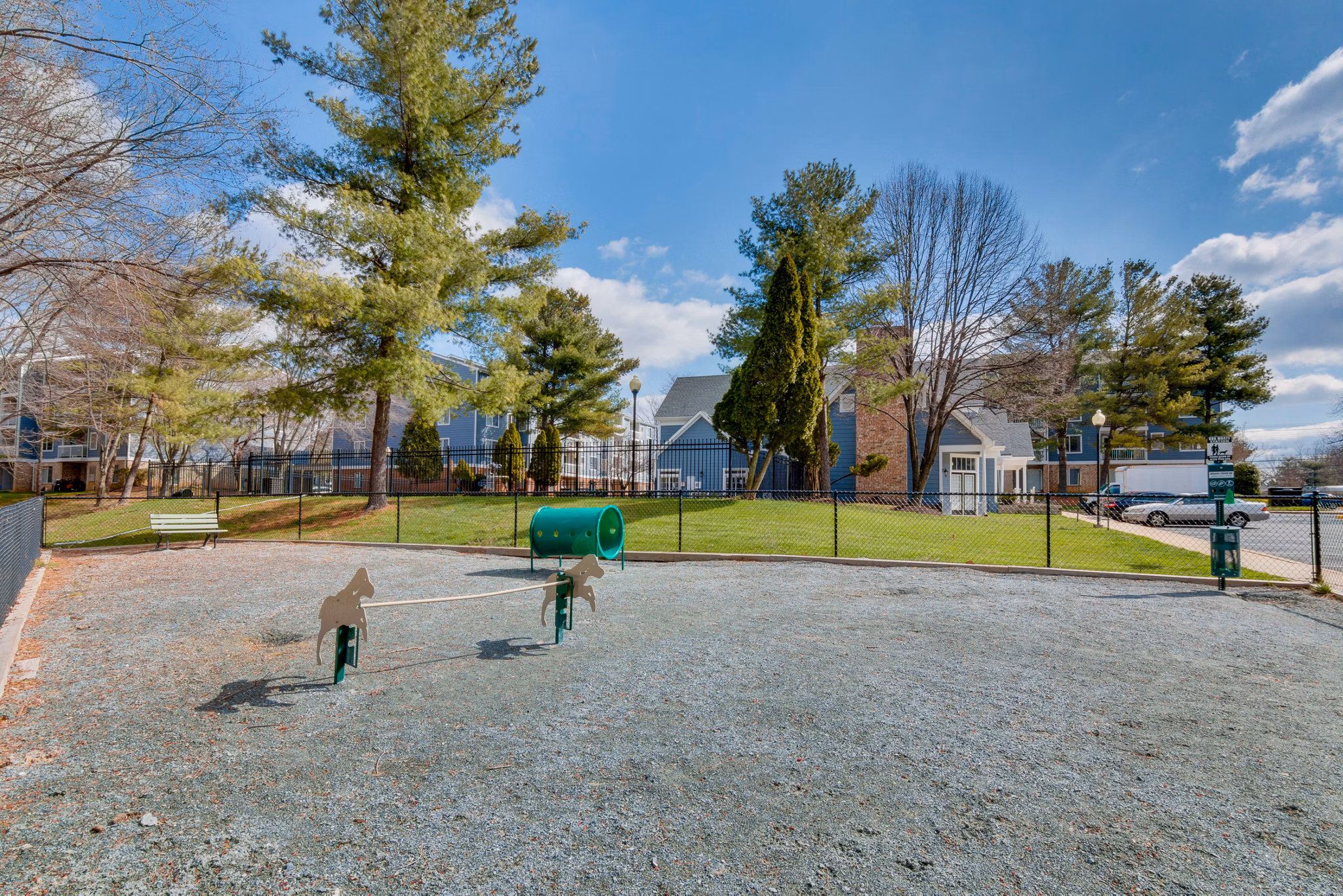 Dog park with agility course at Avana Oak Mill Apartments, a pet-friendly community offering luxury lifestyle amenities