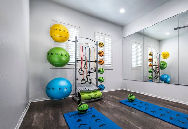 fitness center at Laguna at Arrowhead Ranch Apartments
