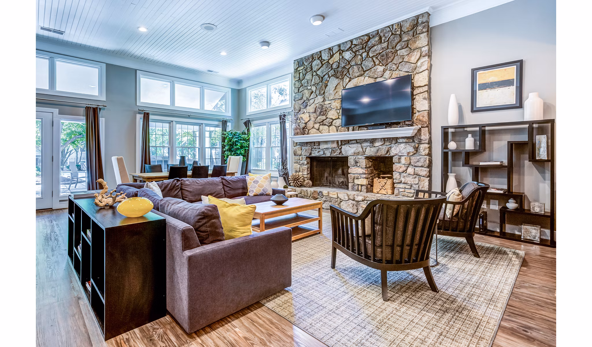 Clubhouse lobby with modern seating and decor at Avana Heather Ridge Apartments, offering a welcoming social space for residents