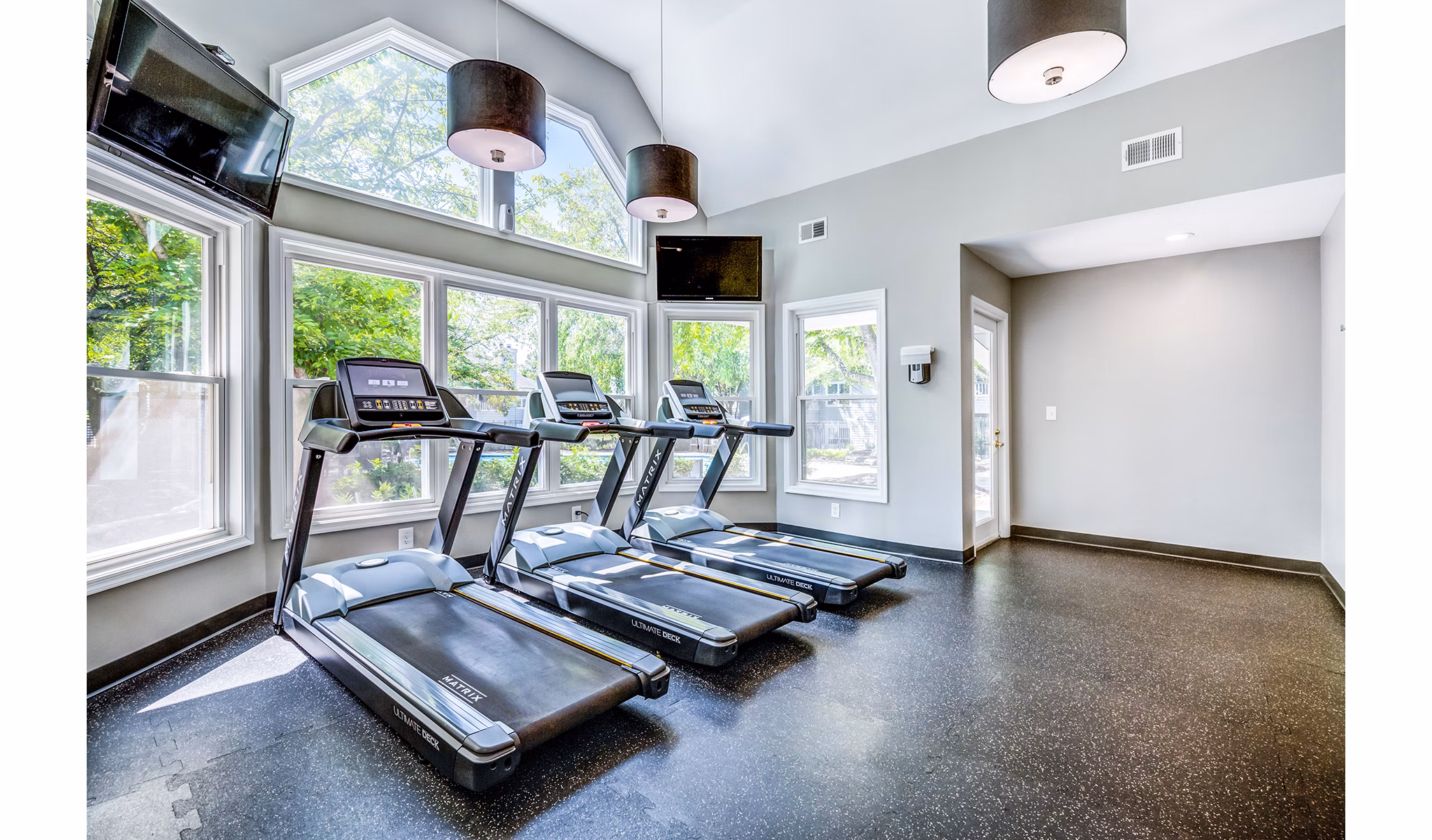 Modern fitness center with state-of-the-art equipment at Avana Heather Ridge Apartments