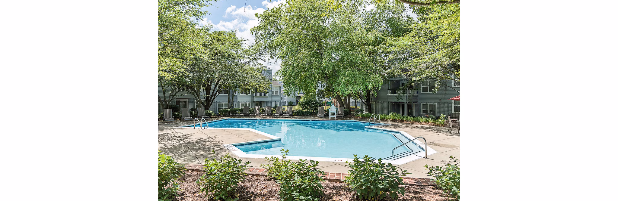 Resort-style outdoor pool at Avana Heather Ridge Apartments offering relaxation and leisure amenities in the vibrant community setting